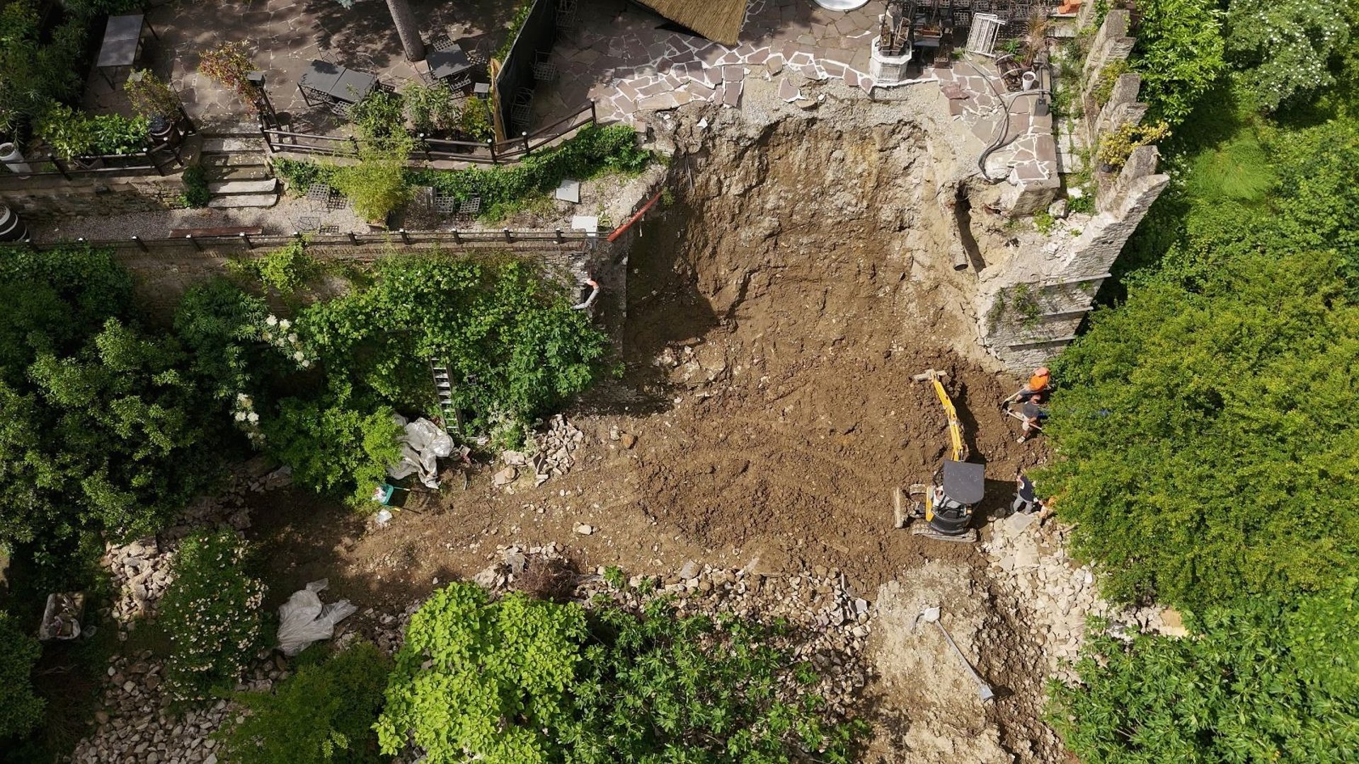 black and brown leather padded tub sofa
