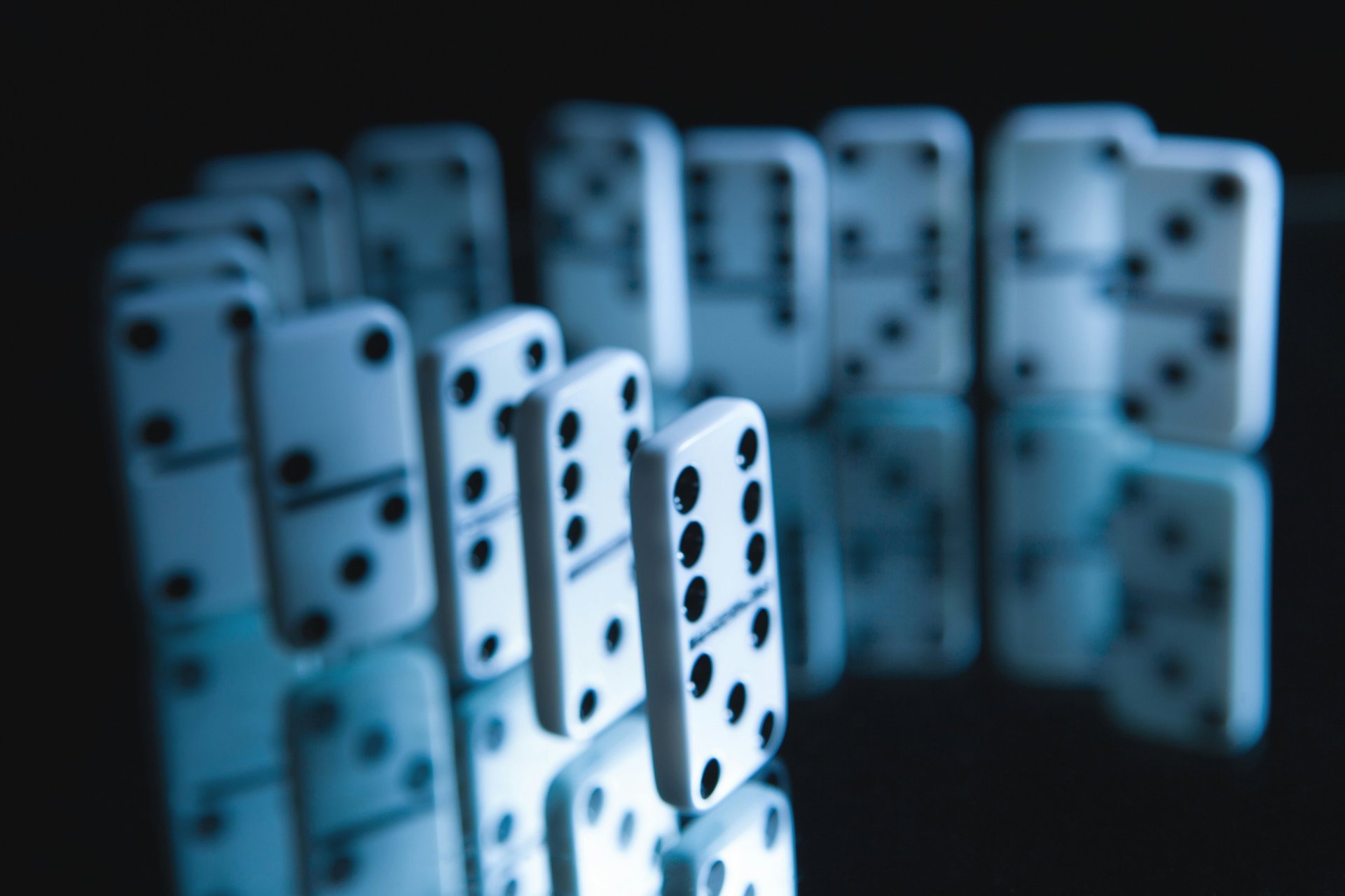 Close-up of interlocking puzzle pieces with warm lighting.