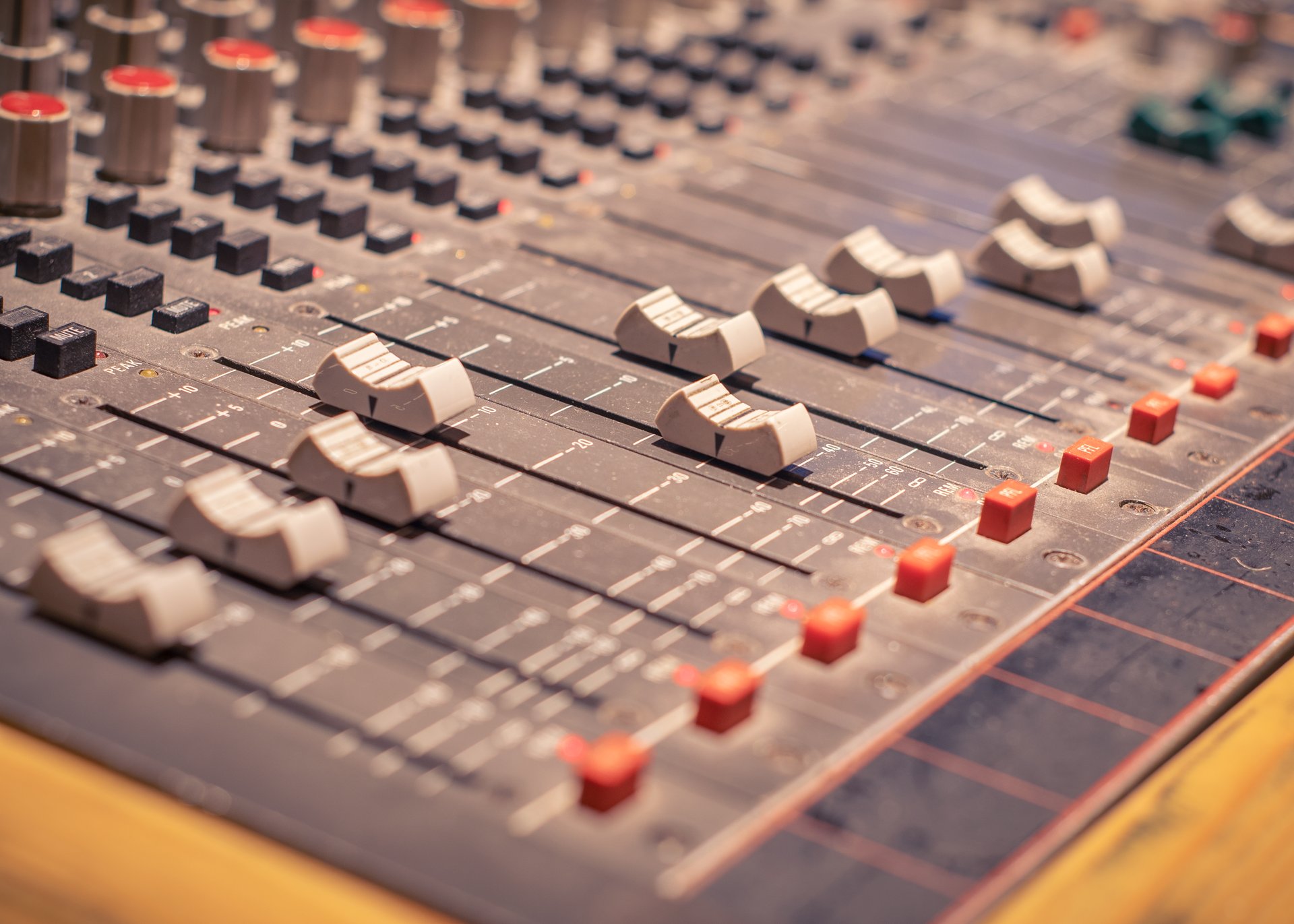 woman wearing yellow long-sleeved dress under white clouds and blue sky during daytime
