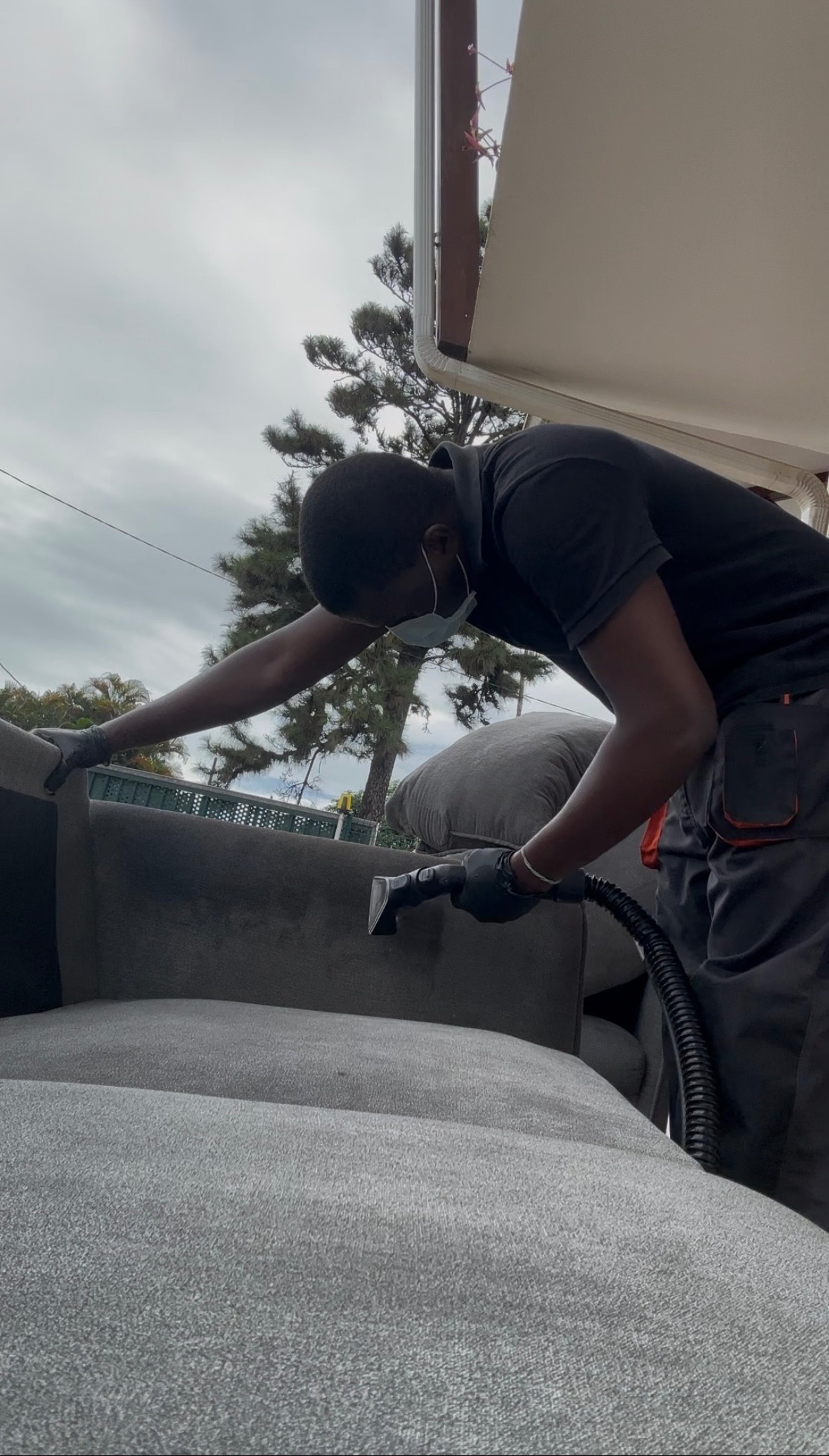 black and brown leather padded tub sofa