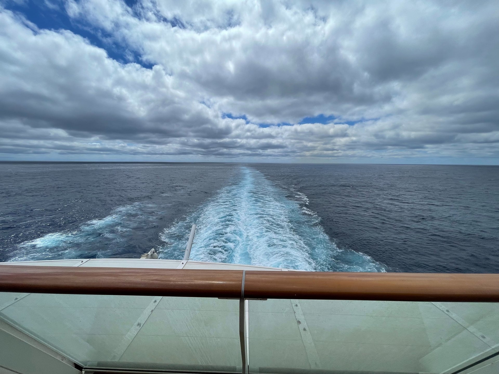 black and brown leather padded tub sofa