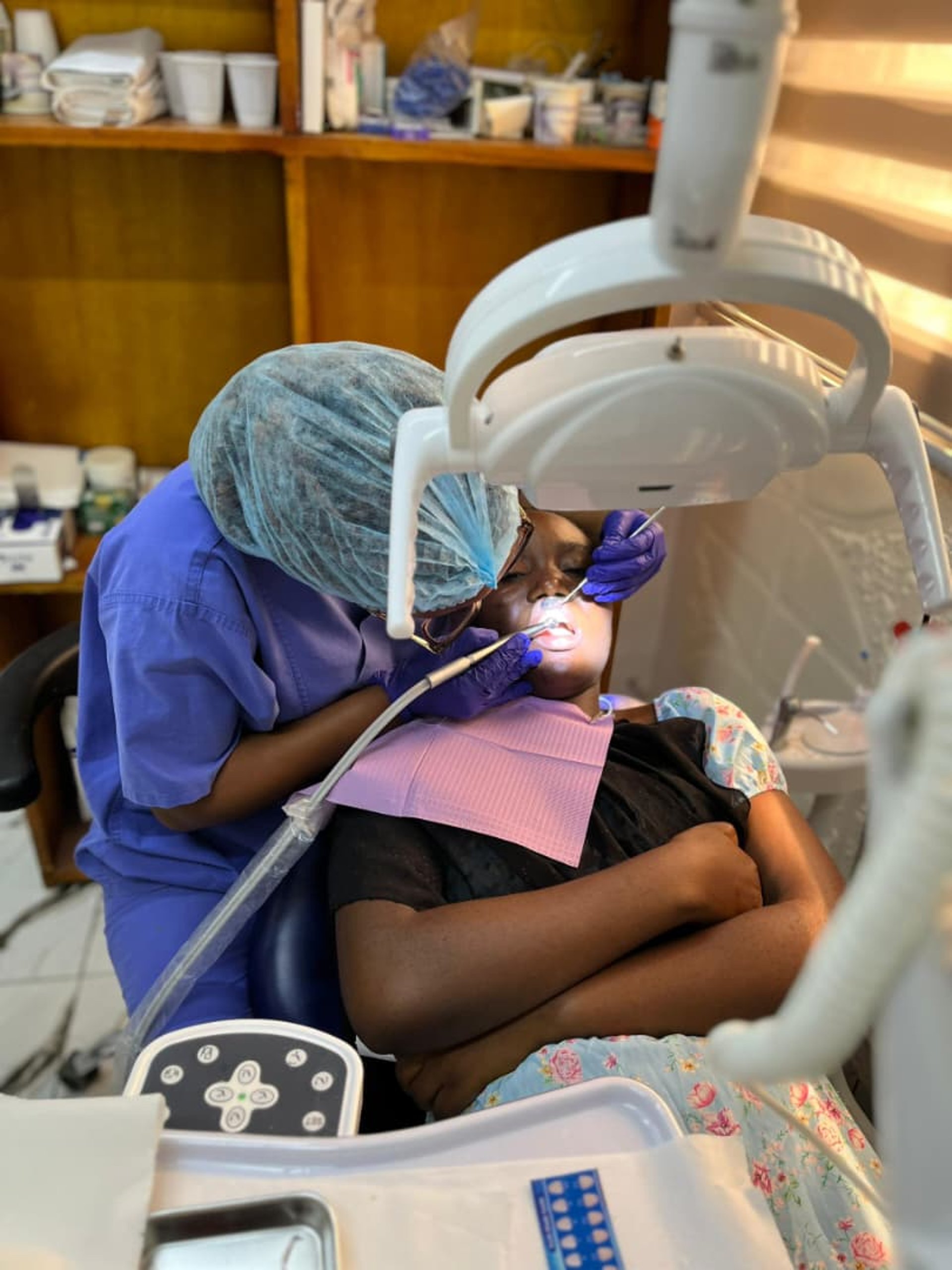 woman wearing yellow long-sleeved dress under white clouds and blue sky during daytime