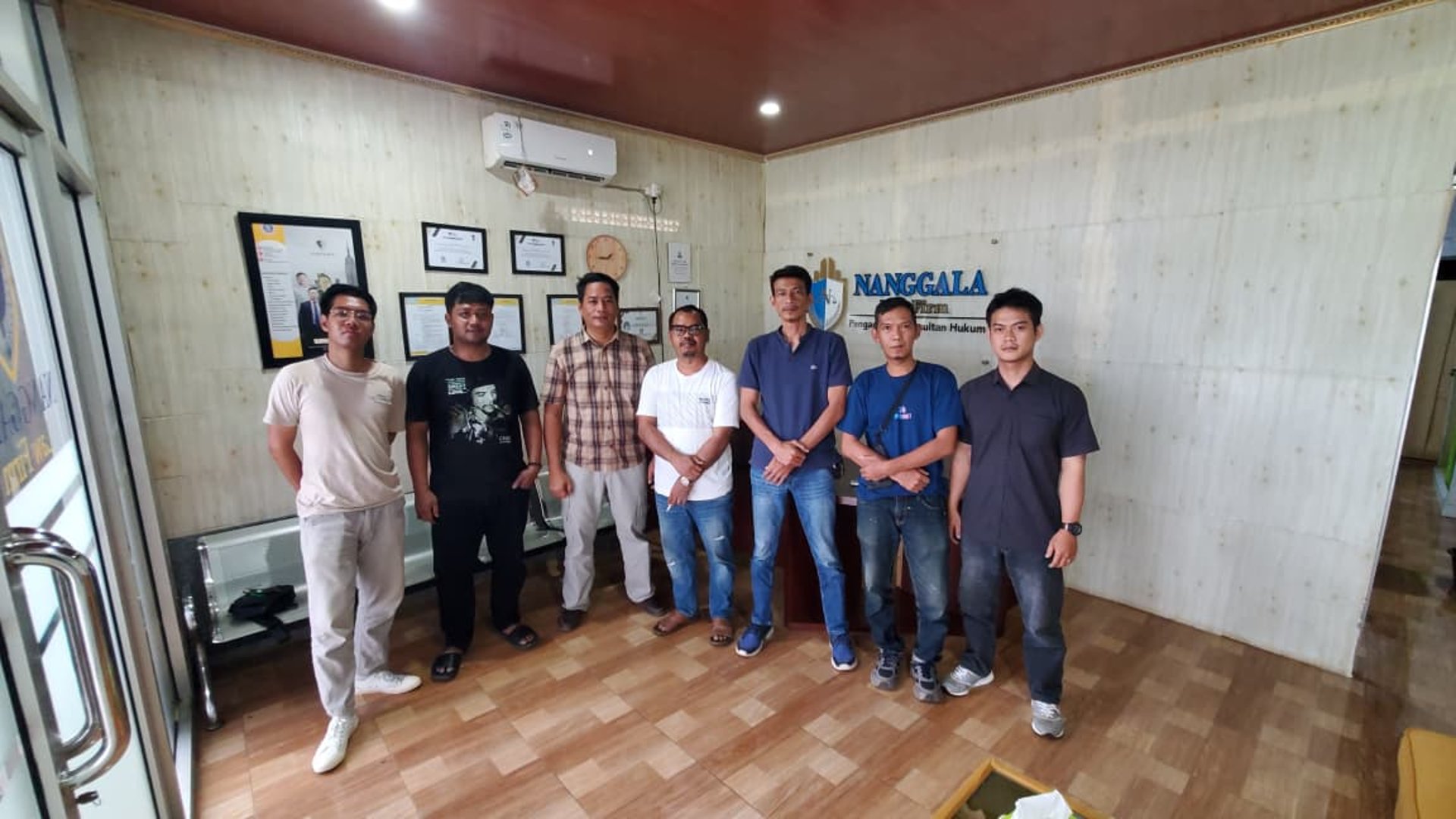 black and brown leather padded tub sofa