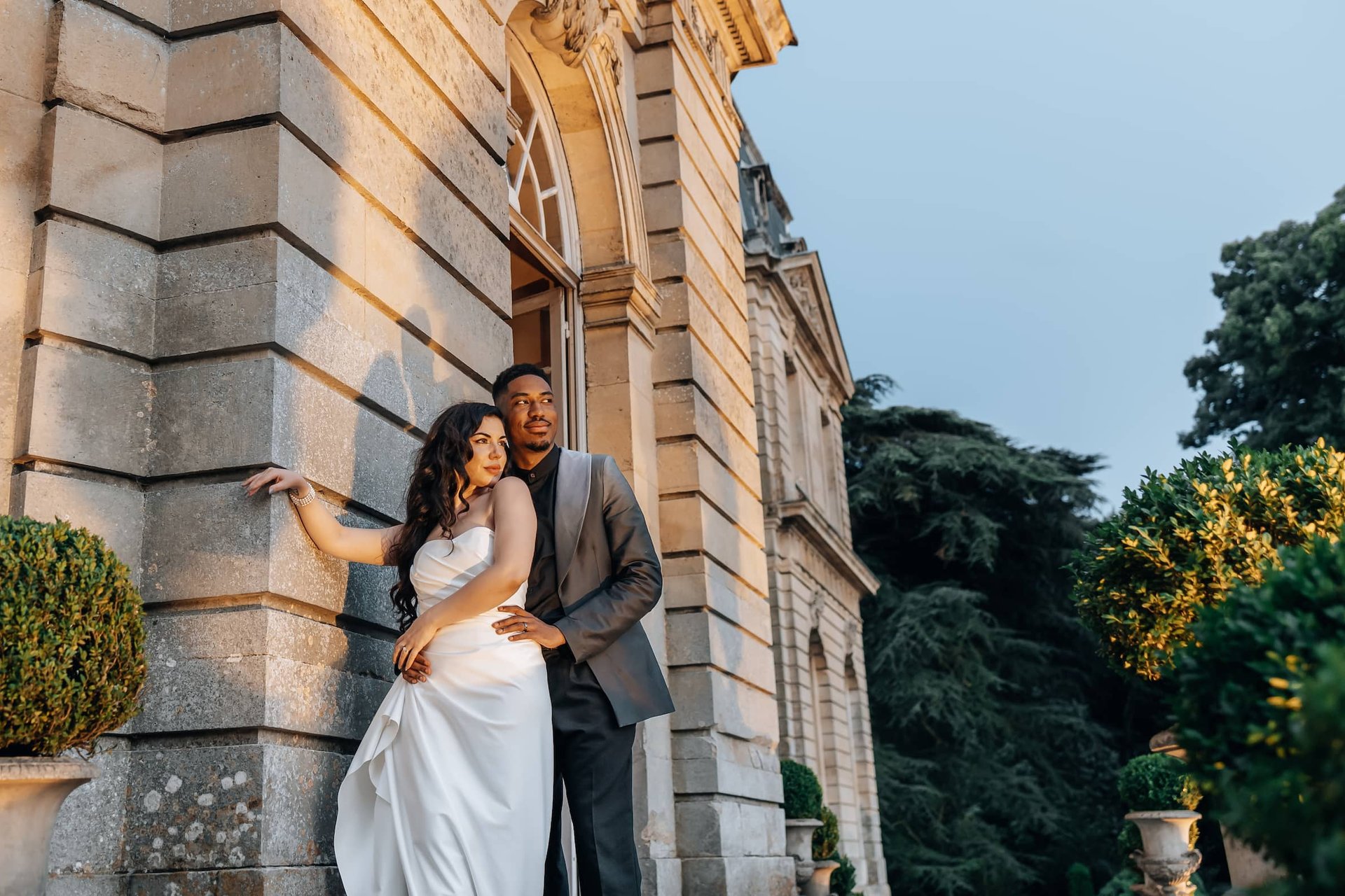 groom beside bride holding bouquet flowers