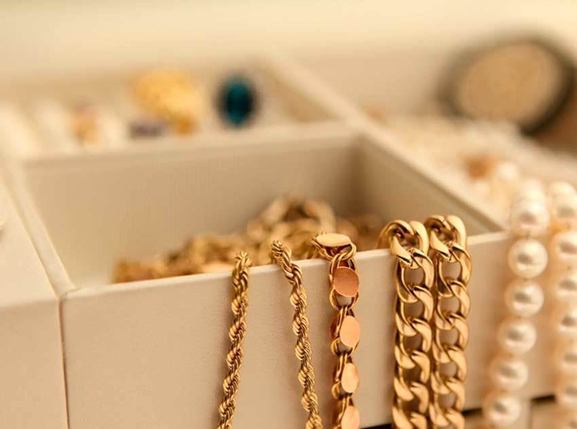 gold-colored jewelries