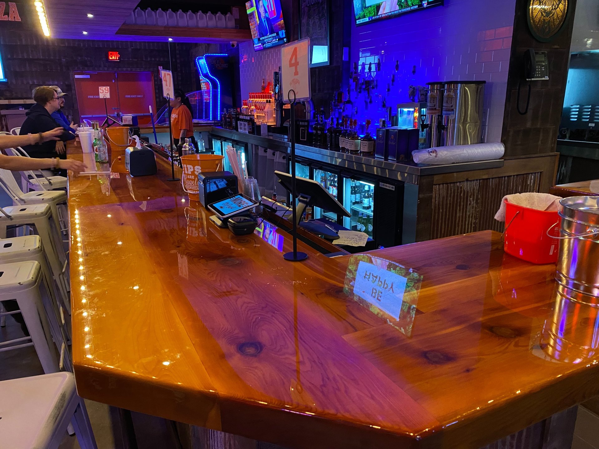 woman wearing yellow long-sleeved dress under white clouds and blue sky during daytime