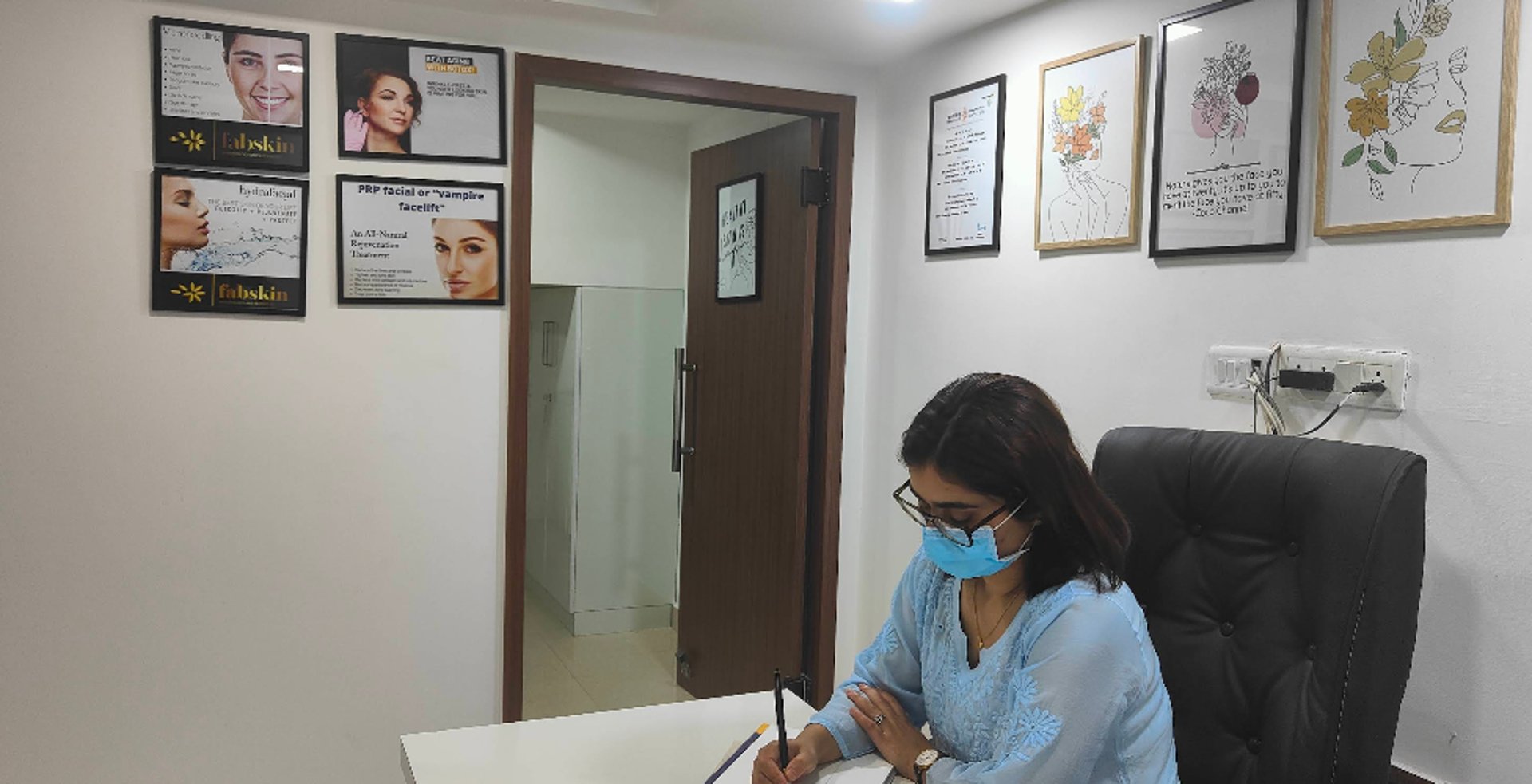 black and brown leather padded tub sofa