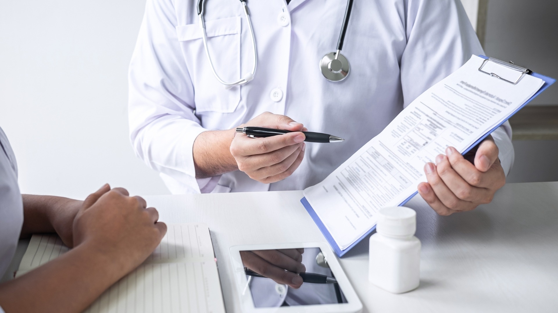 a man and a woman holding dumbs in their hands