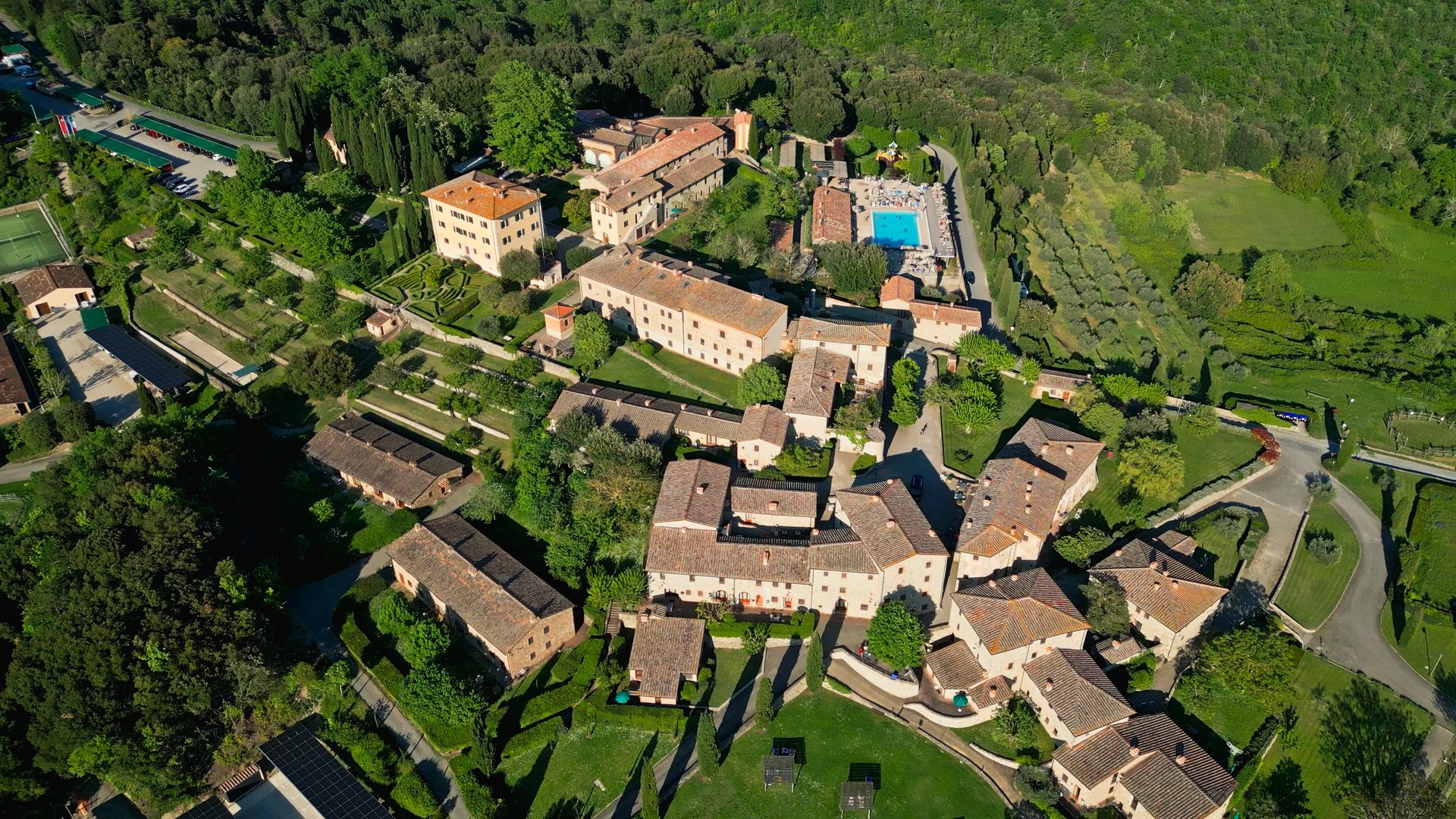 an abstract photo of a curved building with a blue sky in the background