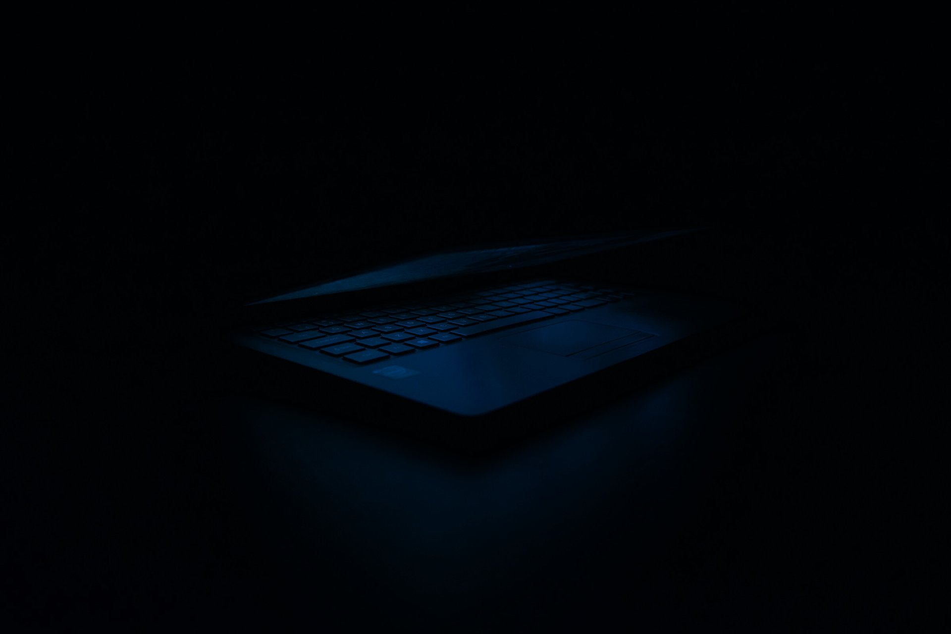 gray and black laptop computer on surface