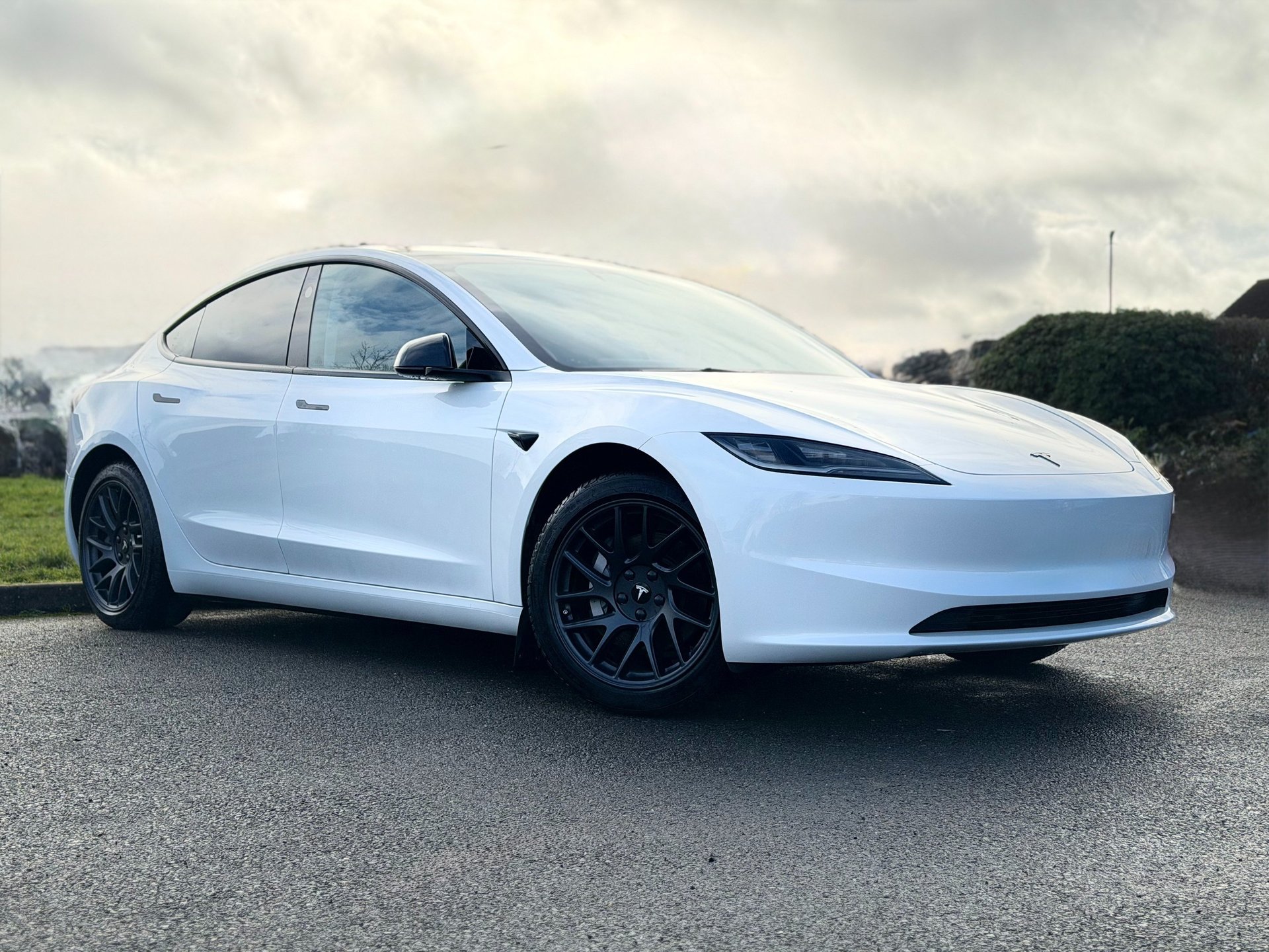 white lamborghini aventador parked in building