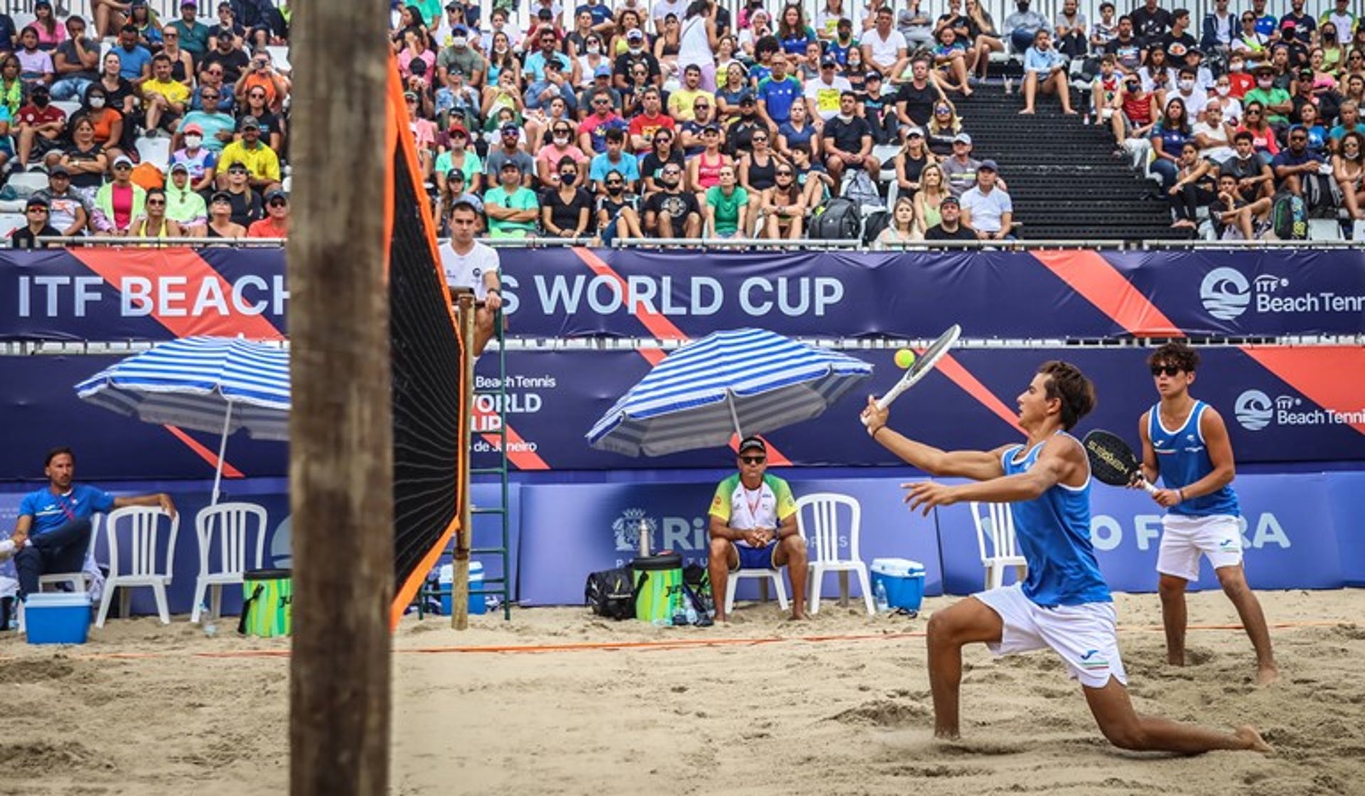 a group of people playing a game of soccer