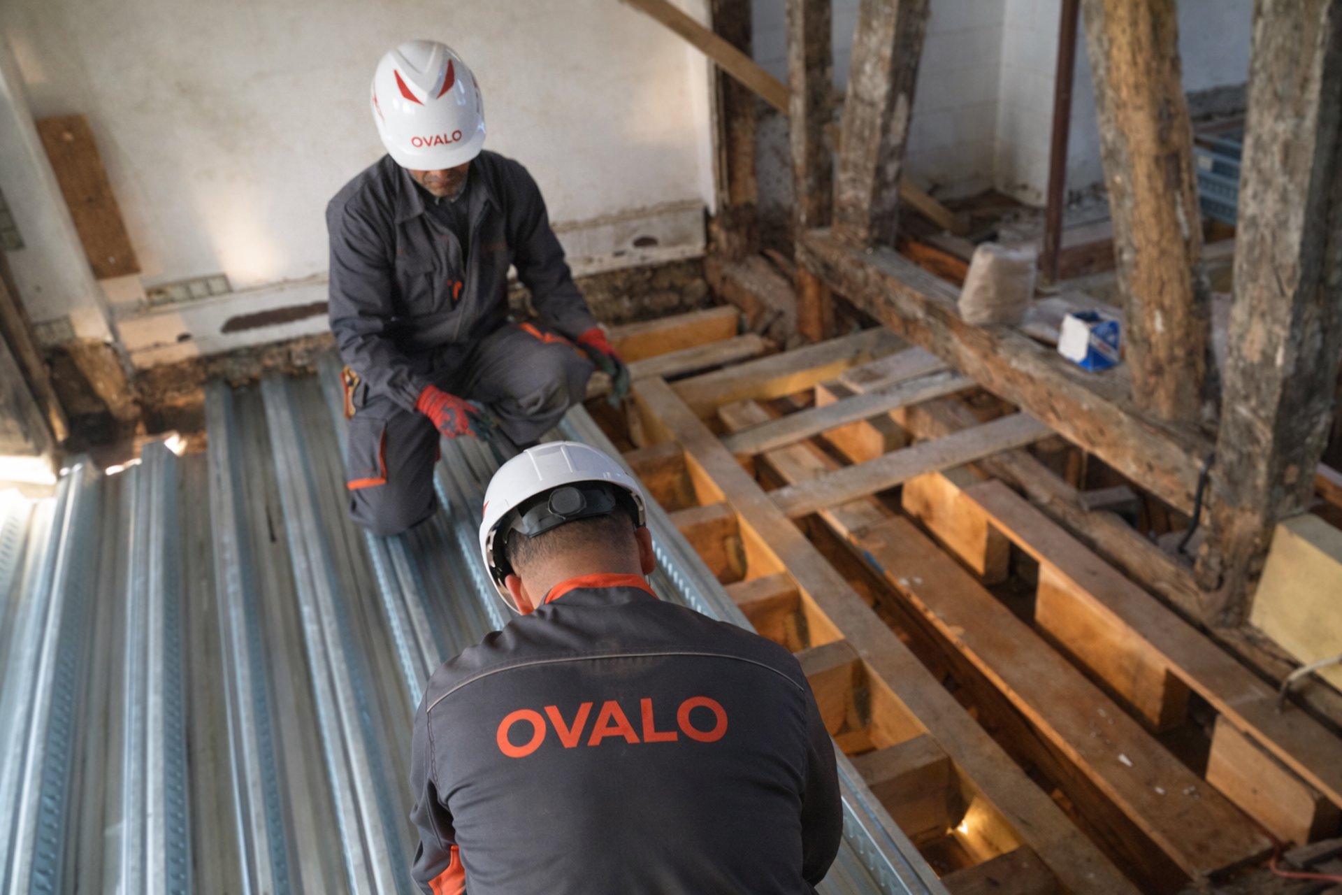 an abstract photo of a curved building with a blue sky in the background