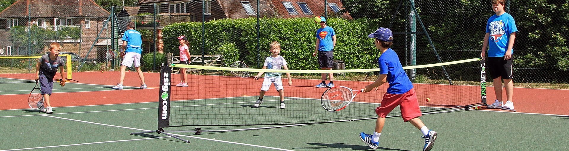 an abstract photo of a curved building with a blue sky in the background