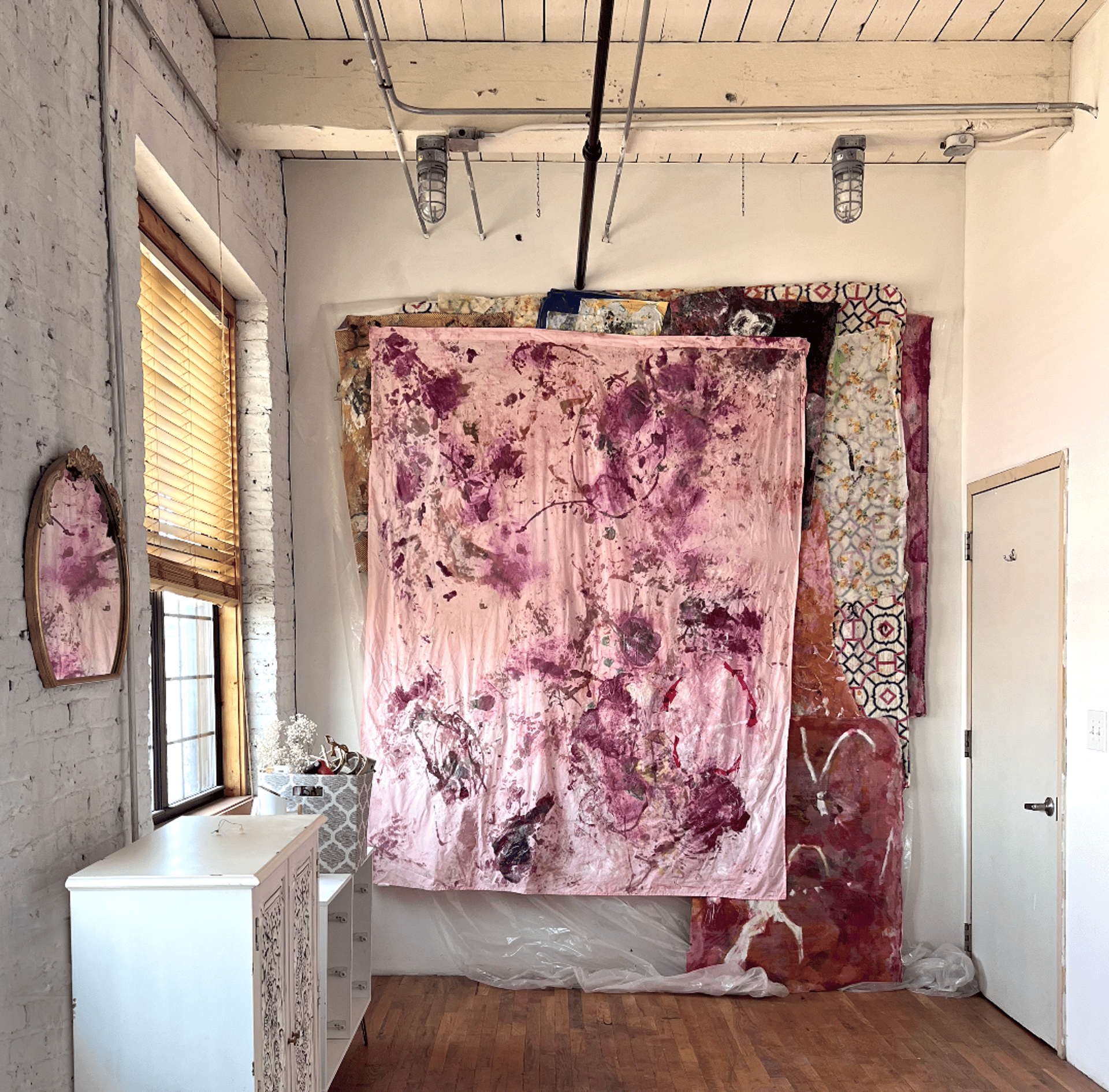 an abstract photo of a curved building with a blue sky in the background