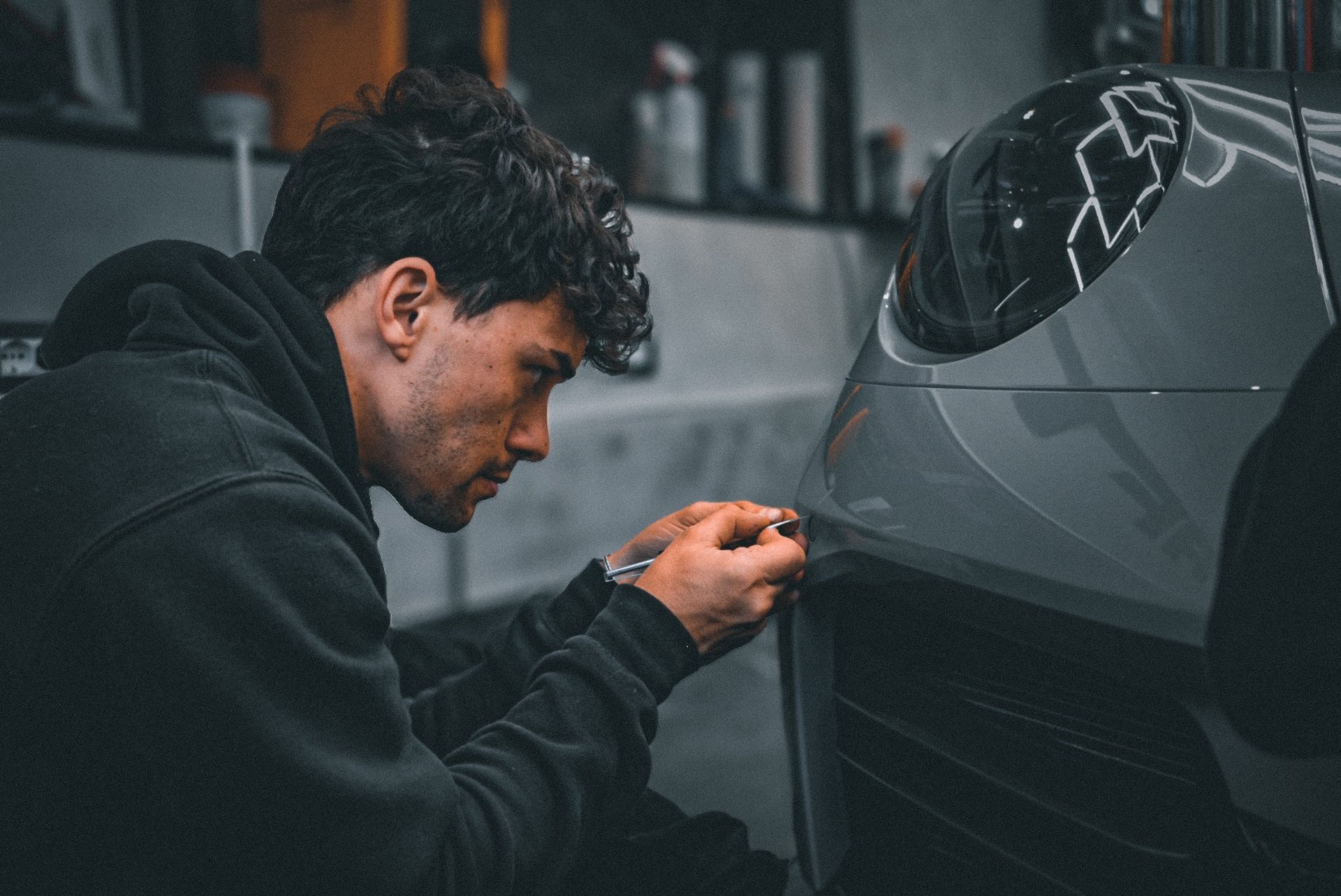 black and brown leather padded tub sofa