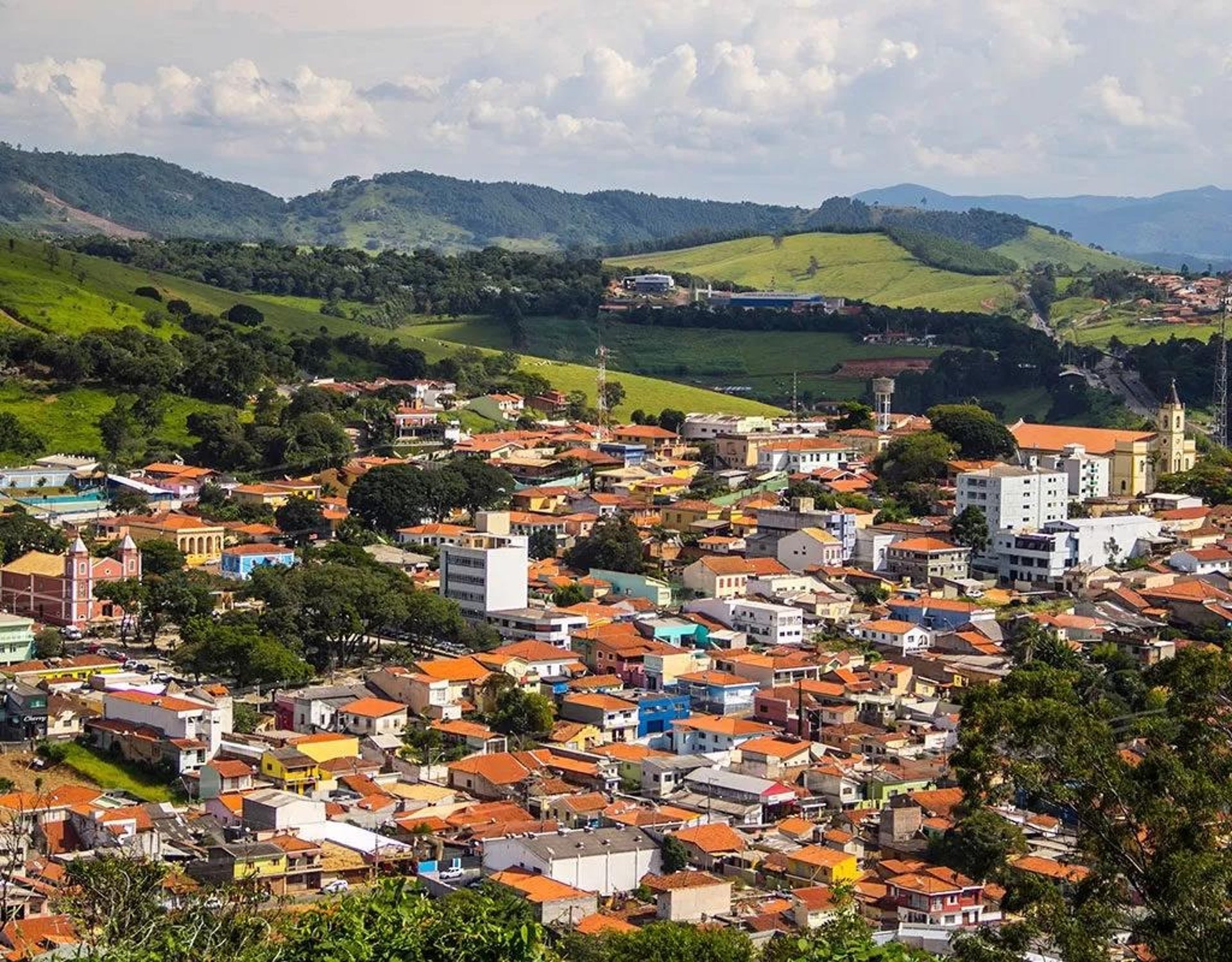 an abstract photo of a curved building with a blue sky in the background