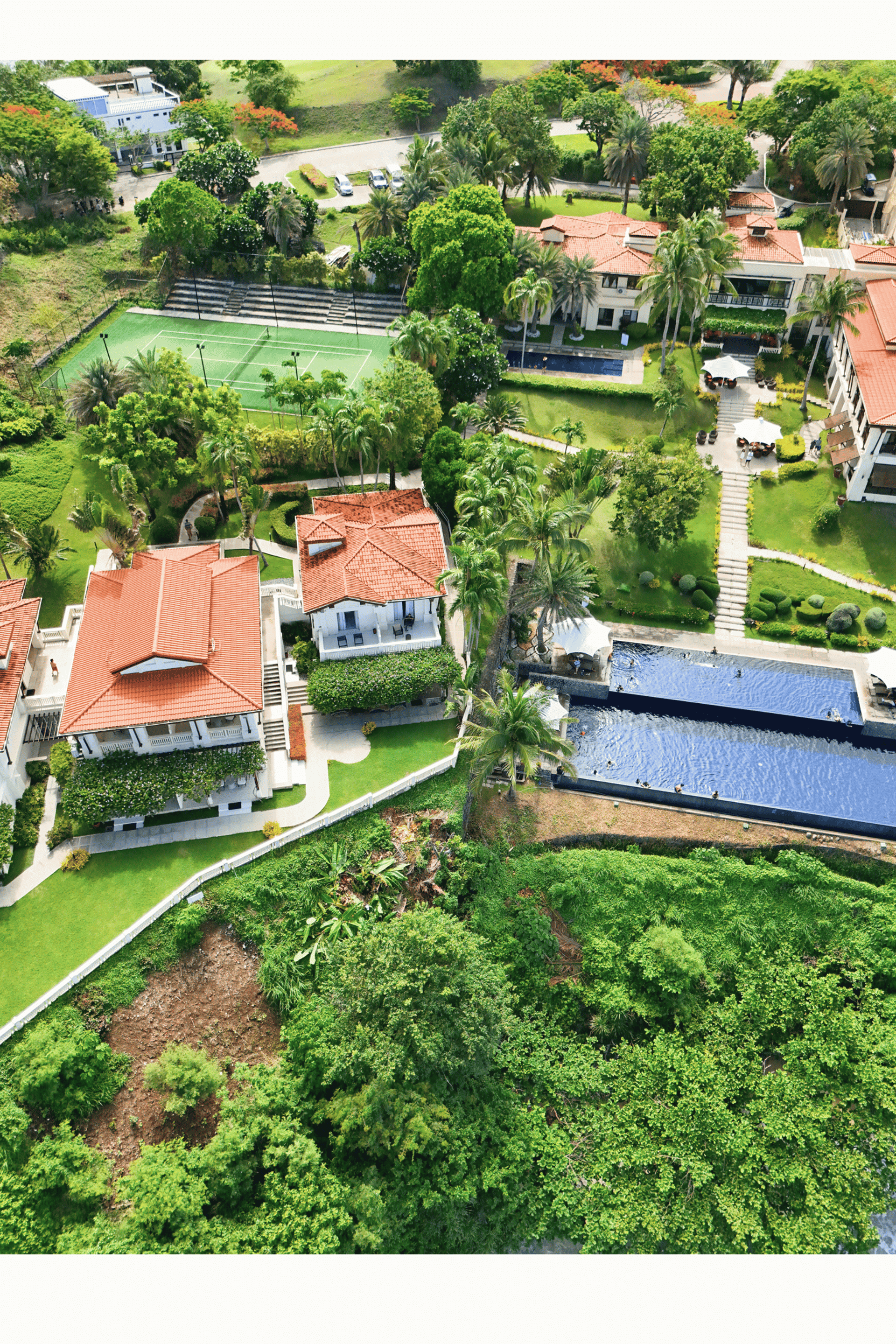 an abstract photo of a curved building with a blue sky in the background