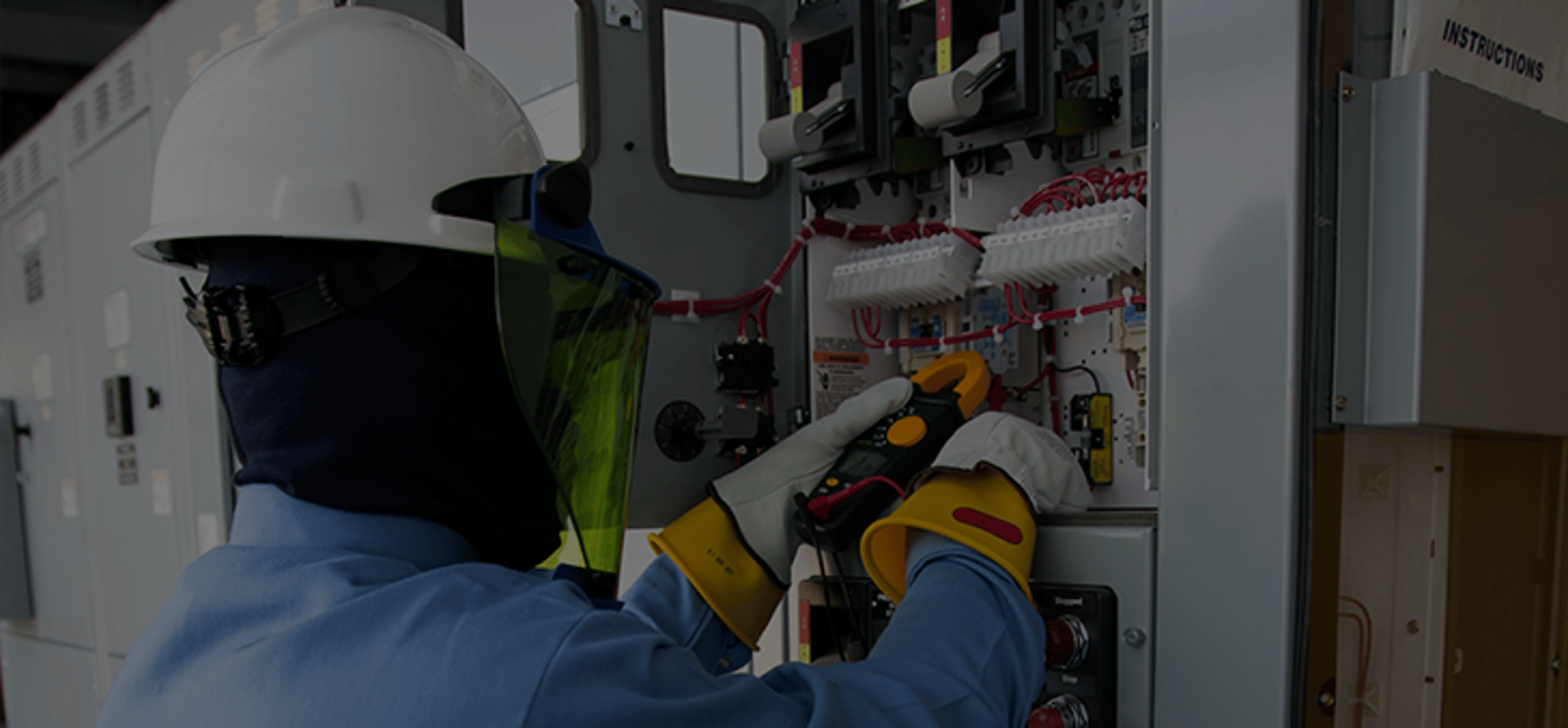 an abstract photo of a curved building with a blue sky in the background