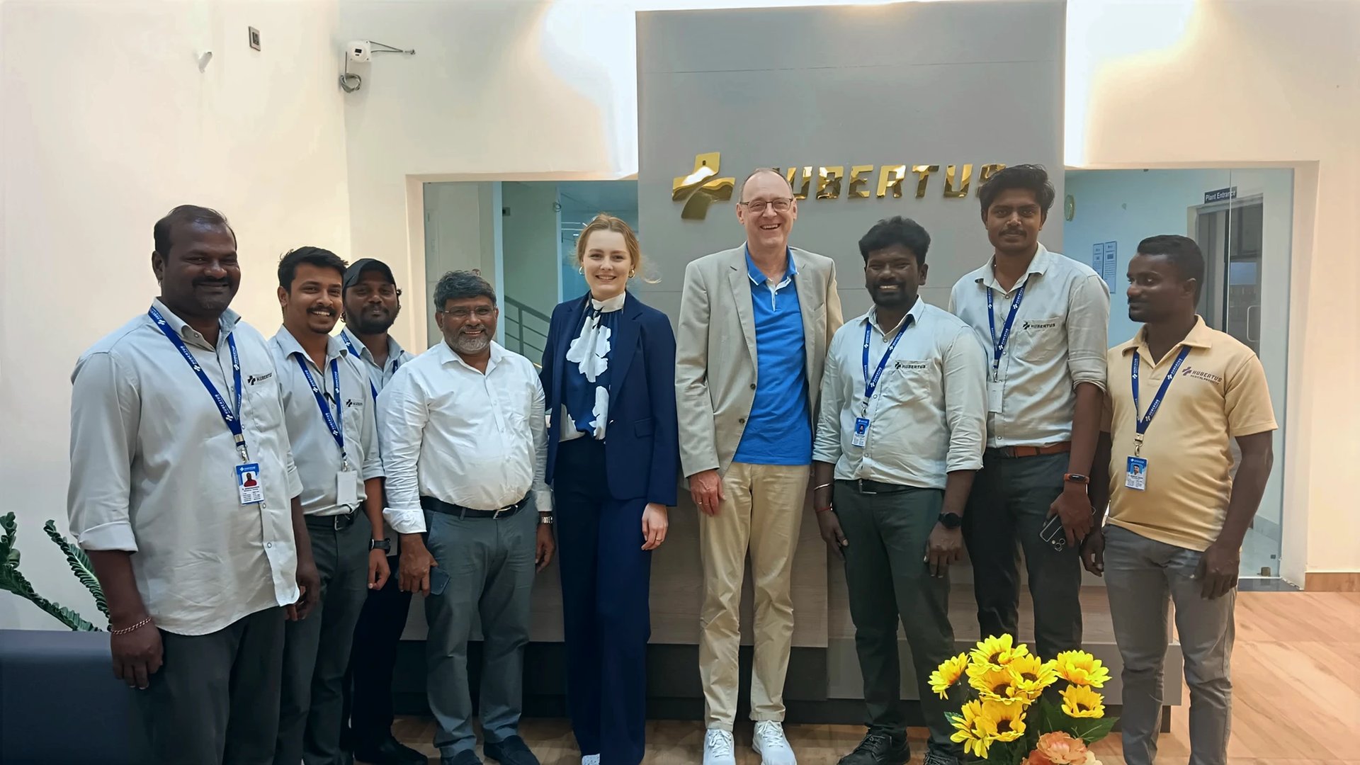an abstract photo of a curved building with a blue sky in the background