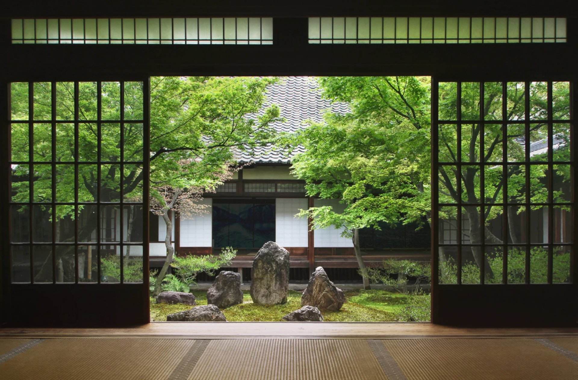 a pagoda with a mountain in the background