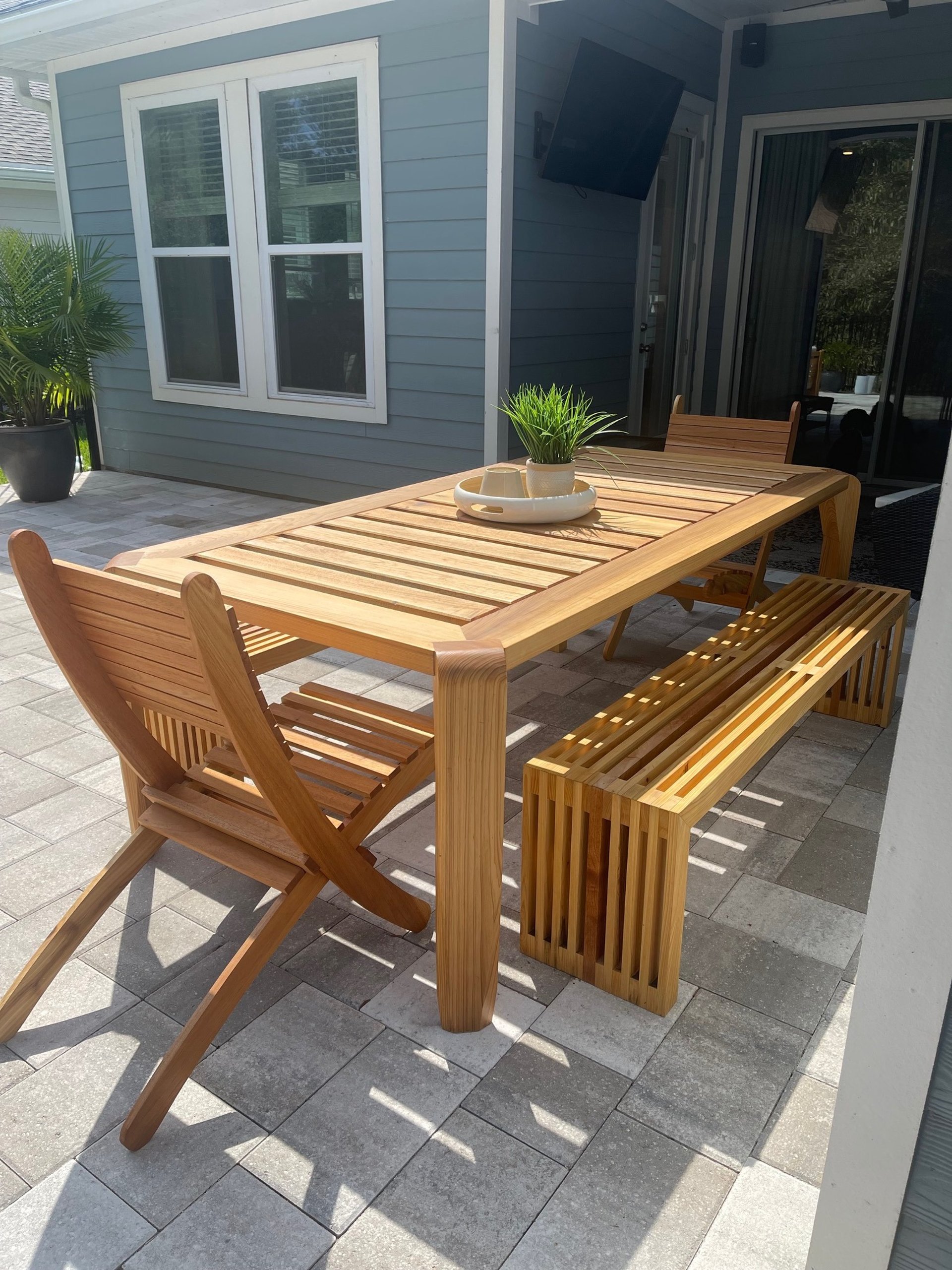 woman wearing yellow long-sleeved dress under white clouds and blue sky during daytime