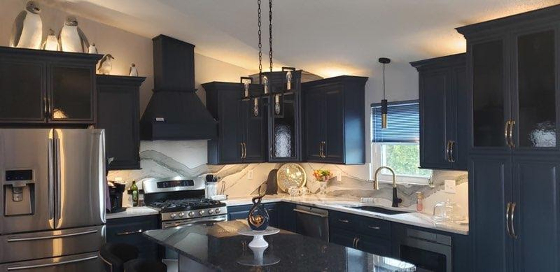 Finished kitchen with cabinets and countertops
