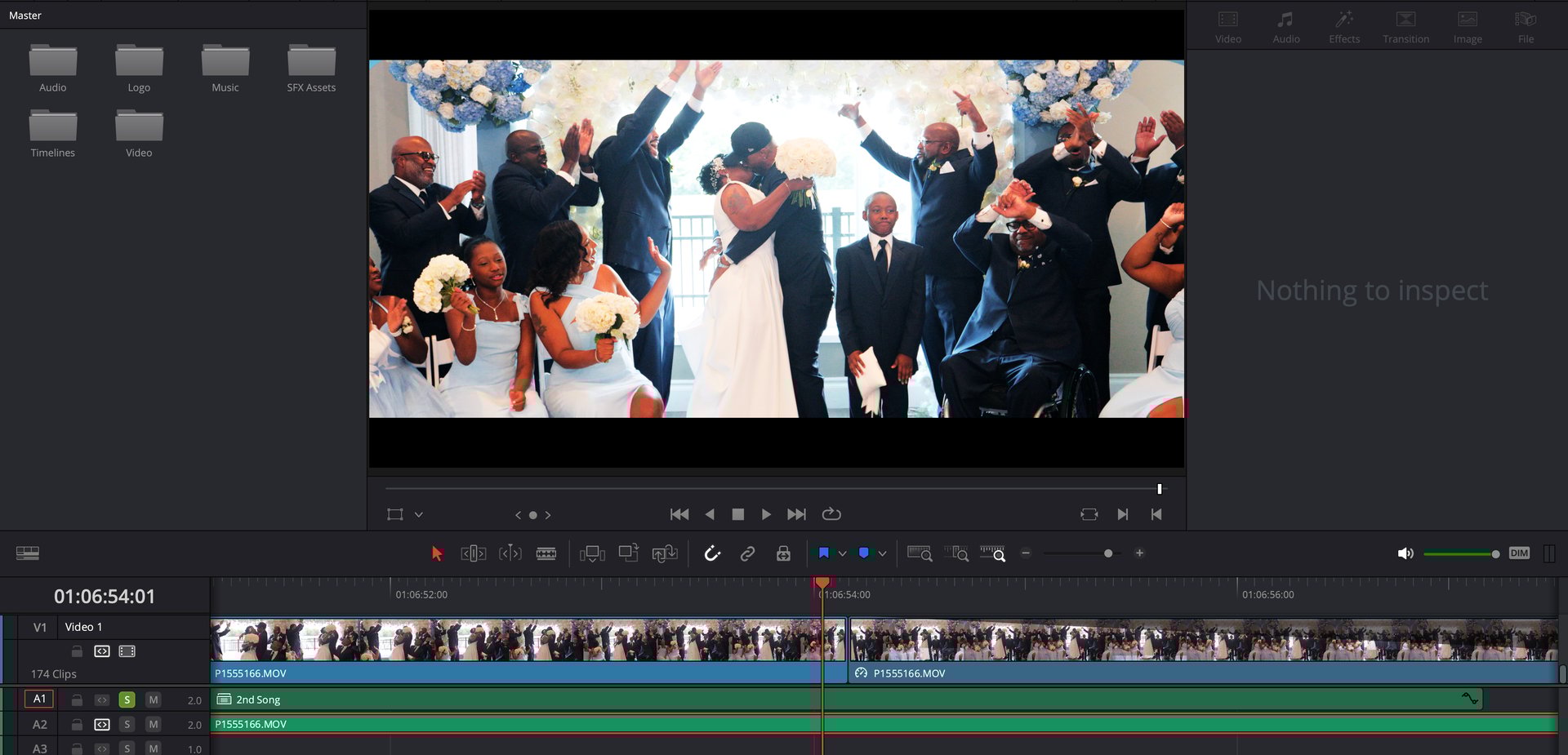 an abstract photo of a curved building with a blue sky in the background