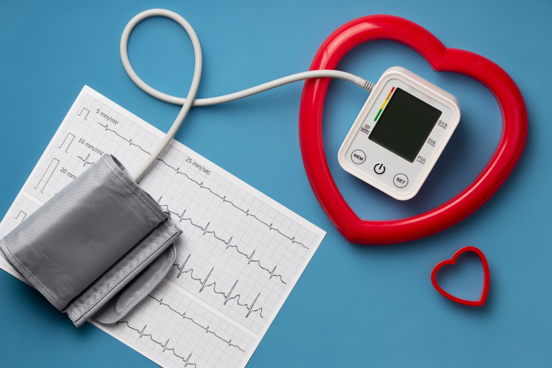 doctor holding red stethoscope