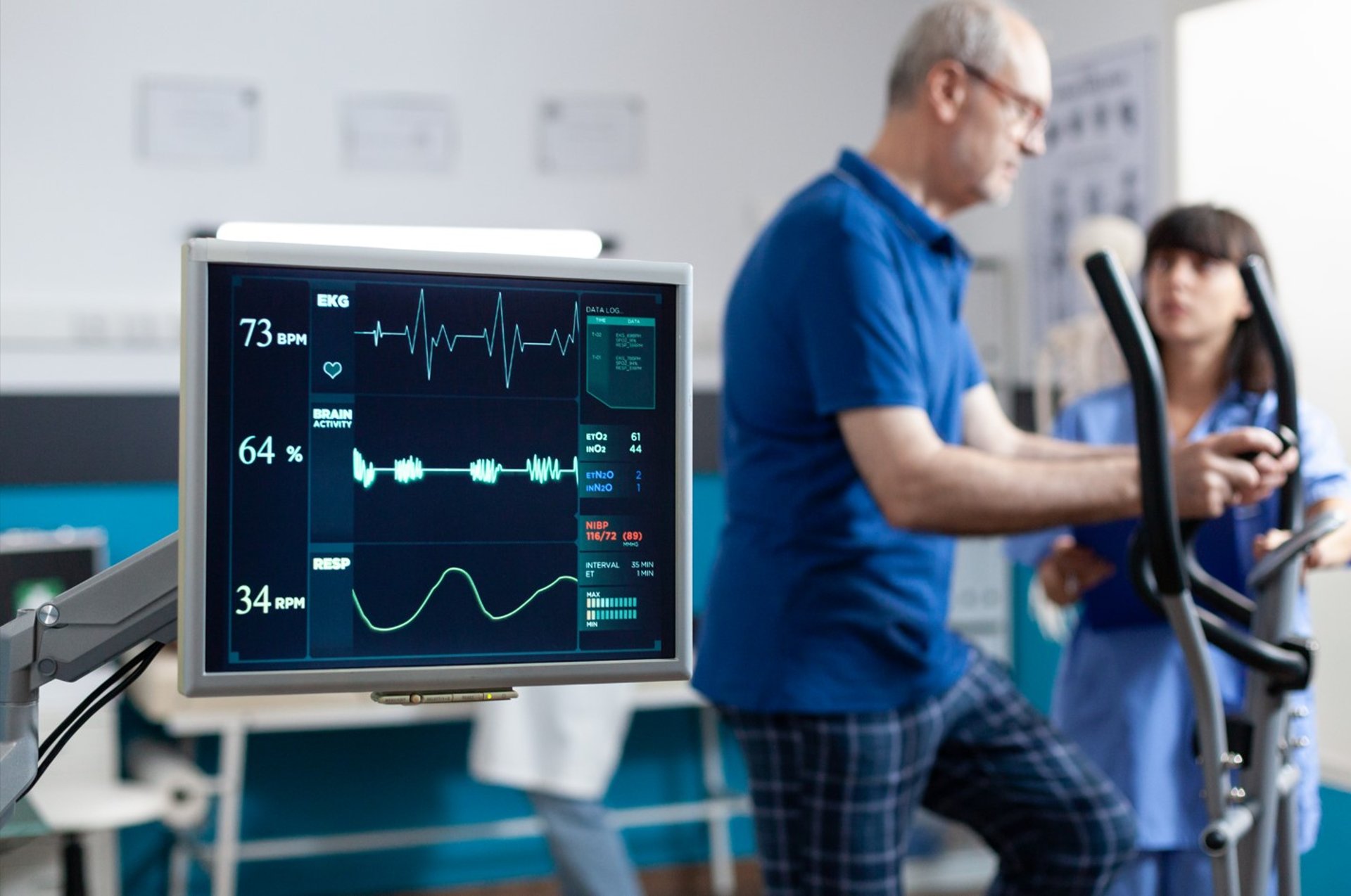 doctor holding red stethoscope