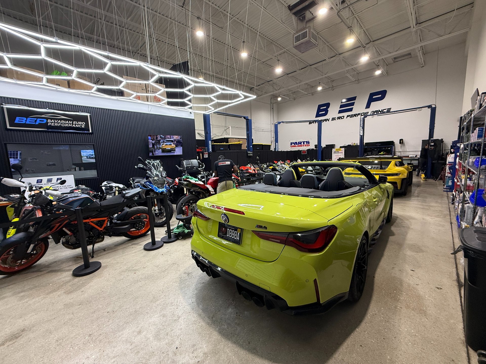 woman wearing yellow long-sleeved dress under white clouds and blue sky during daytime