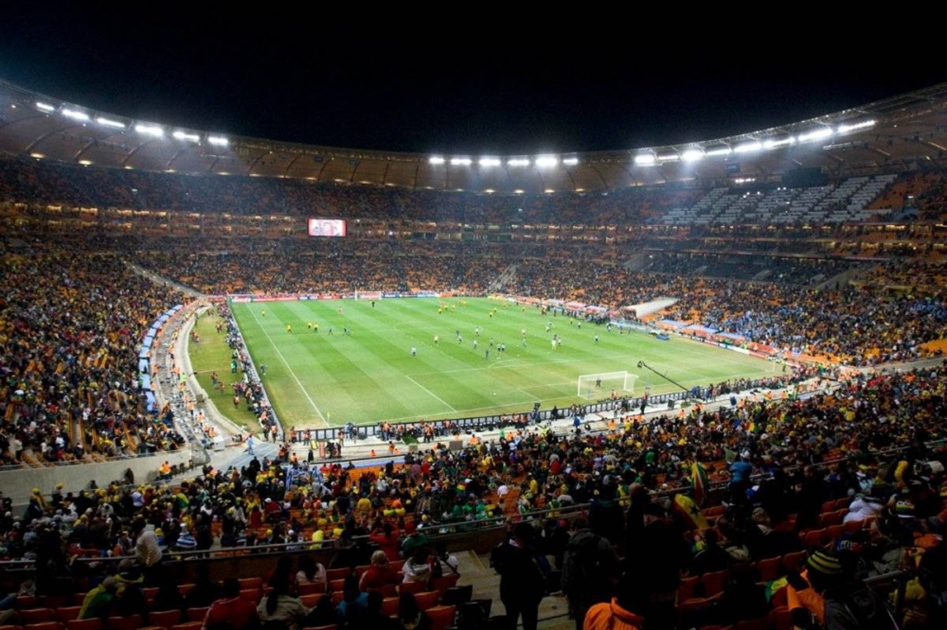 people watching football game on stadium