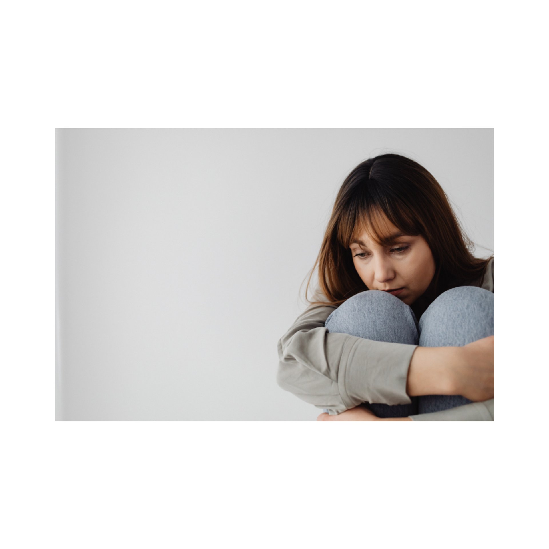 an abstract photo of a curved building with a blue sky in the background