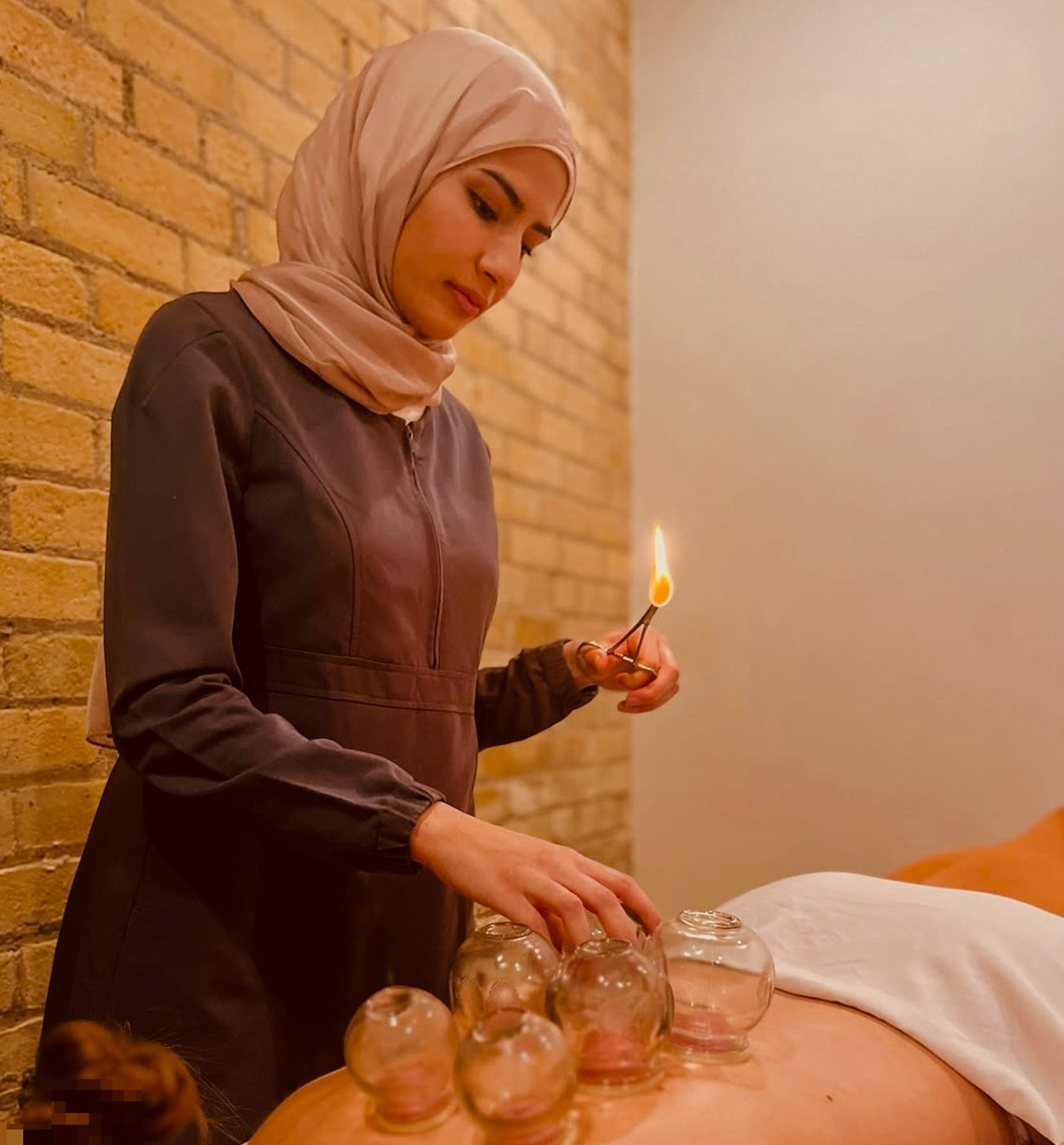 an abstract photo of a curved building with a blue sky in the background