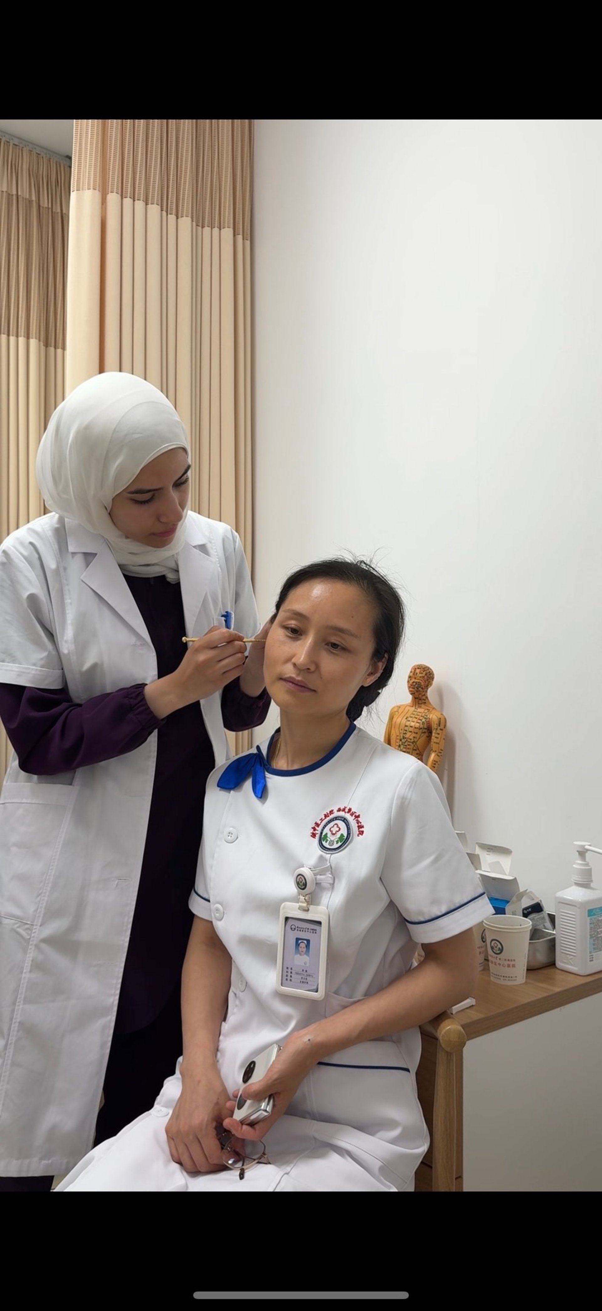 an abstract photo of a curved building with a blue sky in the background