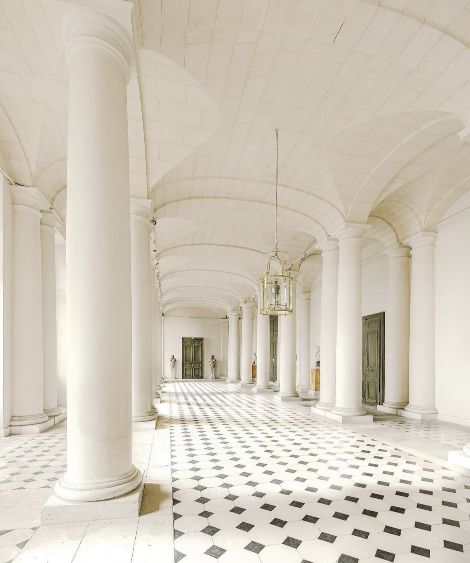 woman in white hijab smiling