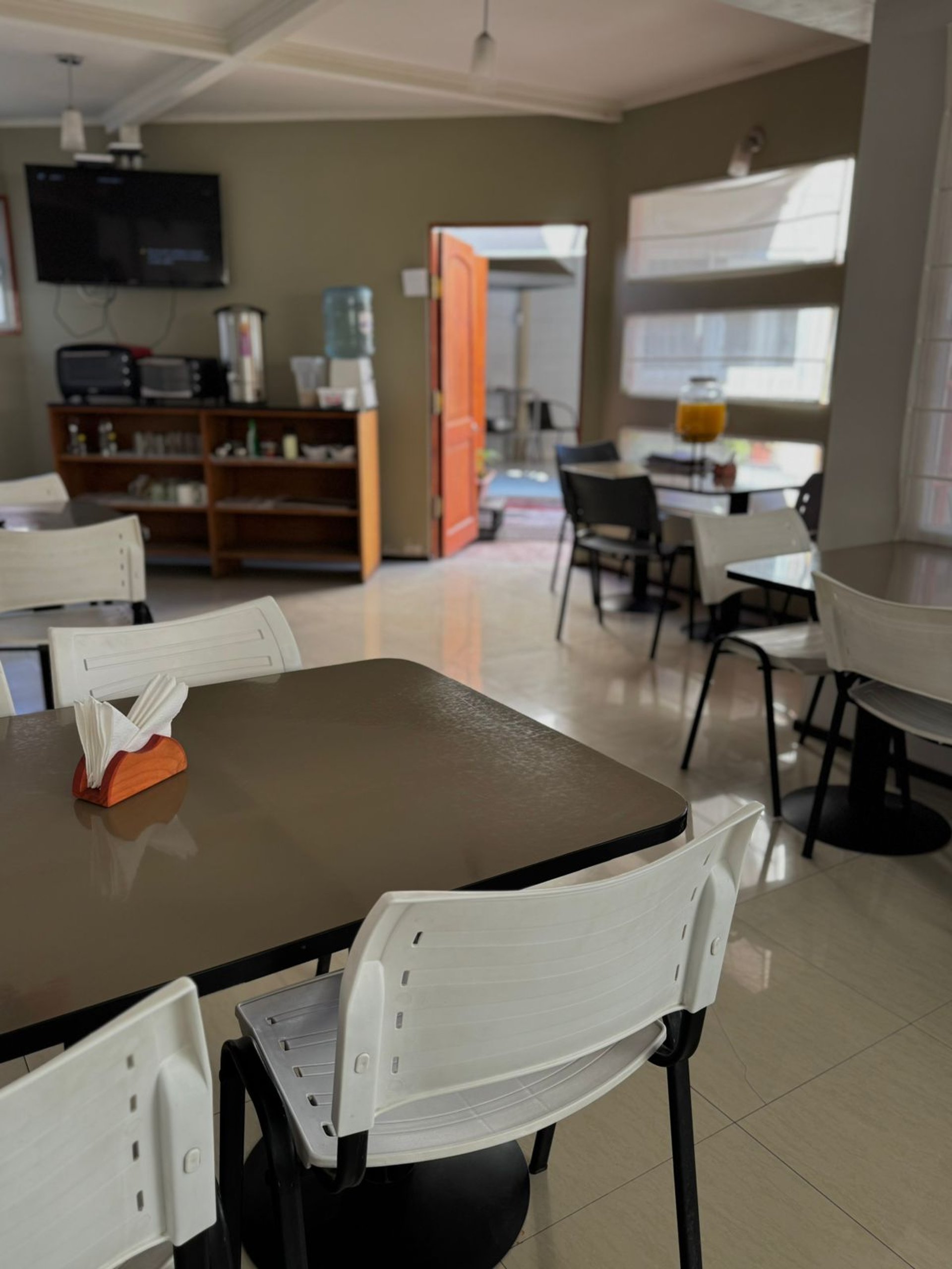 a view of a valley with wind mills in the distance