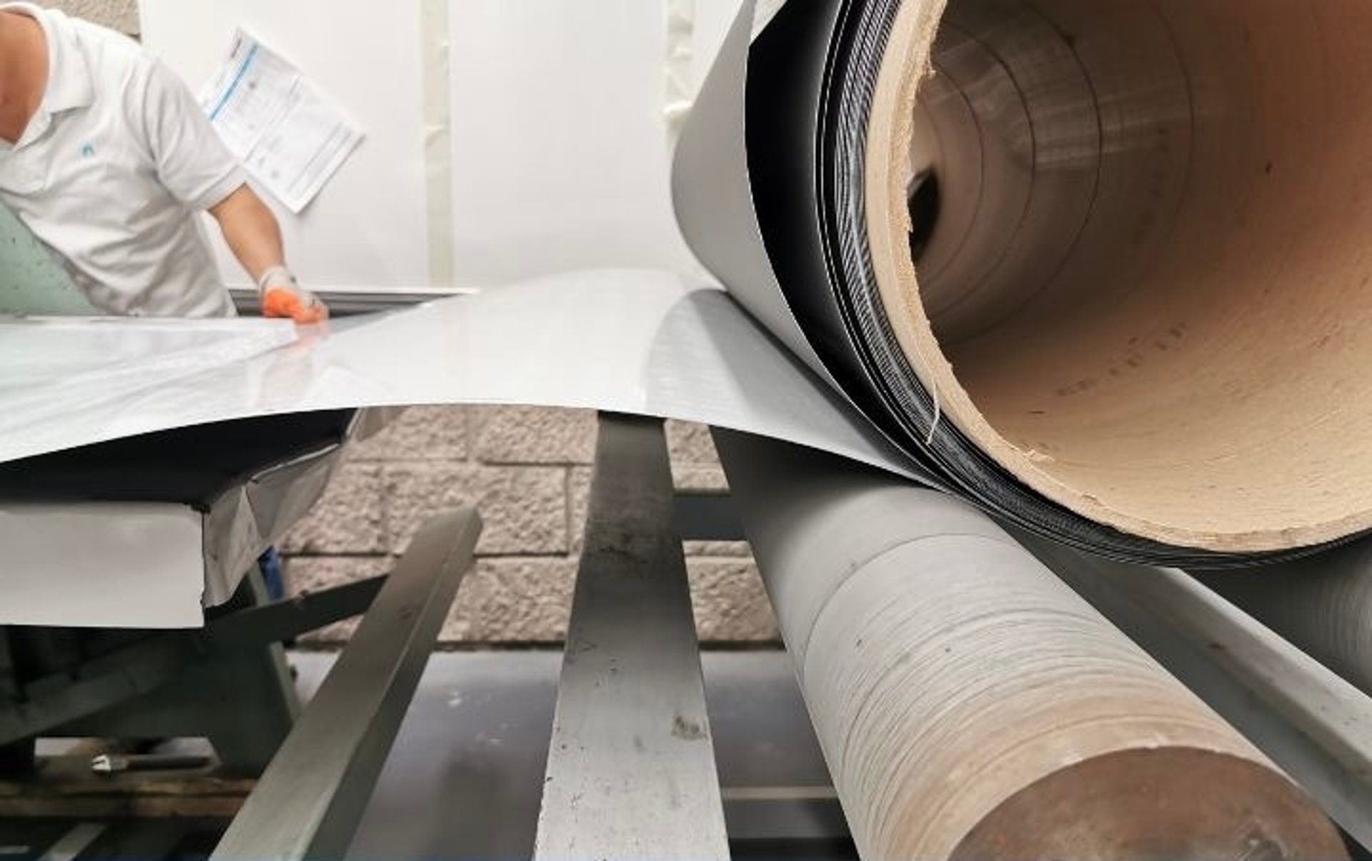 two people drawing on whiteboard