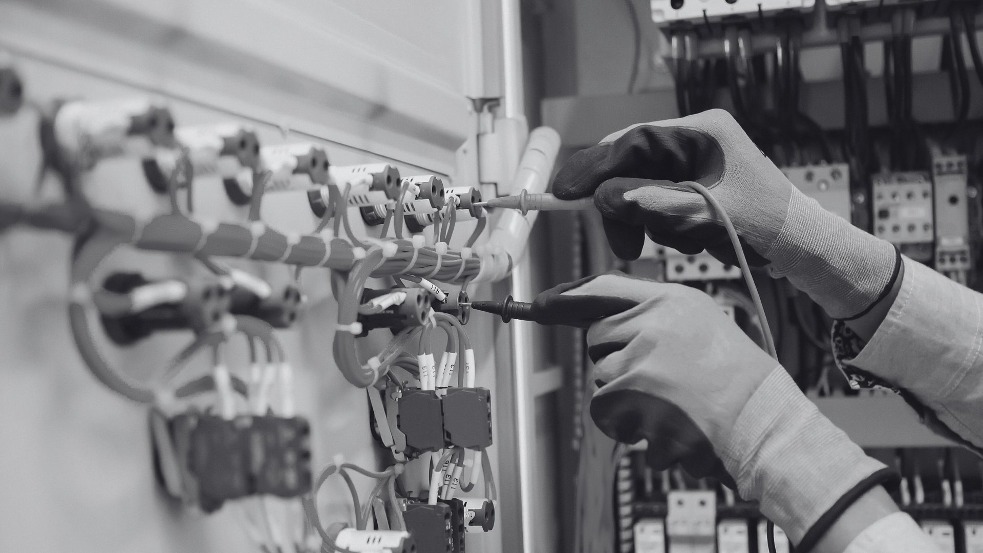 man in black and white long sleeve shirt wearing orange helmet