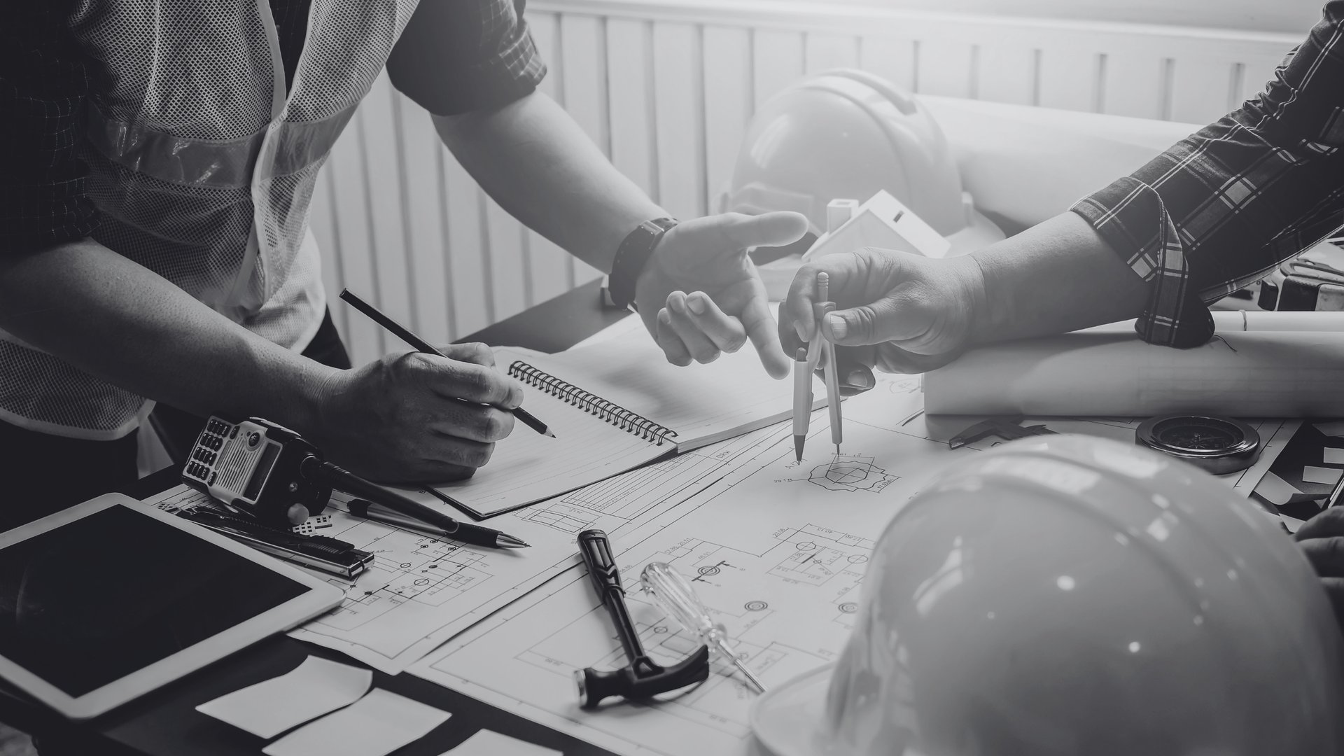 an abstract photo of a curved building with a blue sky in the background