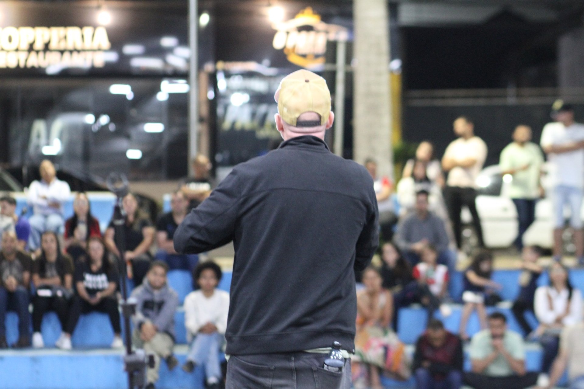 an abstract photo of a curved building with a blue sky in the background