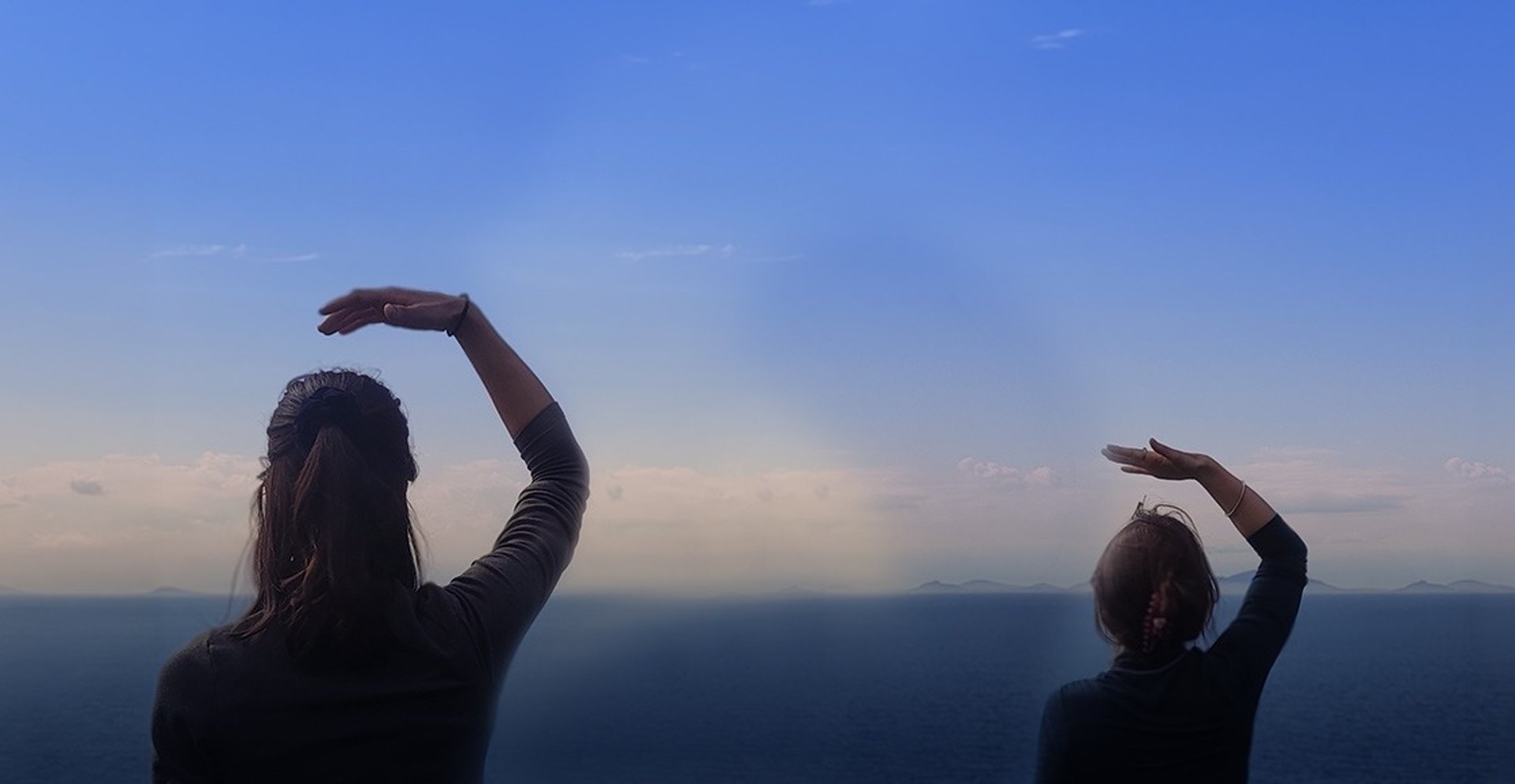 an abstract photo of a curved building with a blue sky in the background
