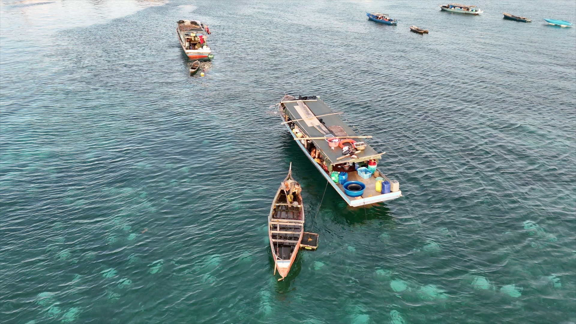 boat on sand near ocean