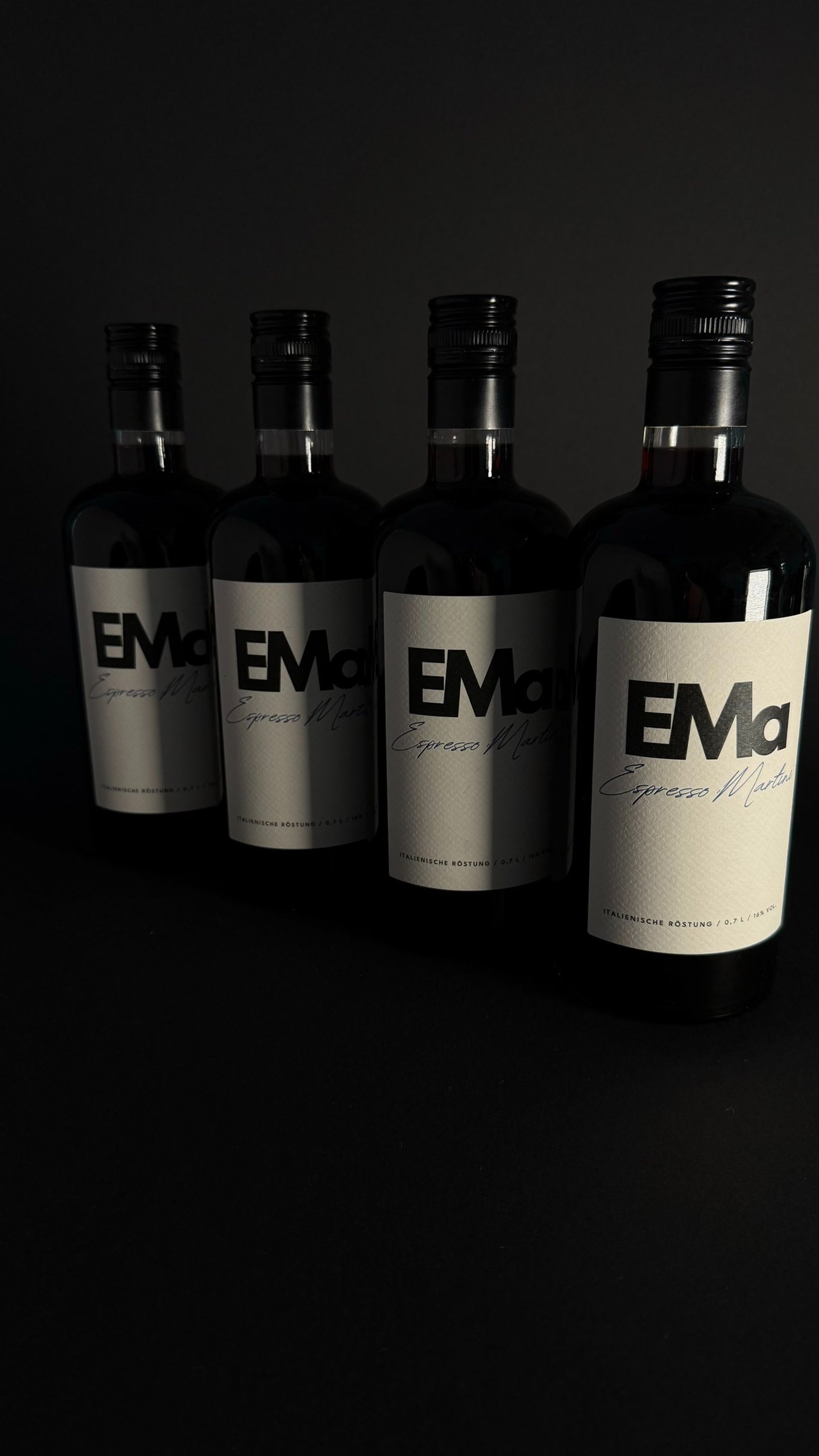 a person pouring liquid into a glass