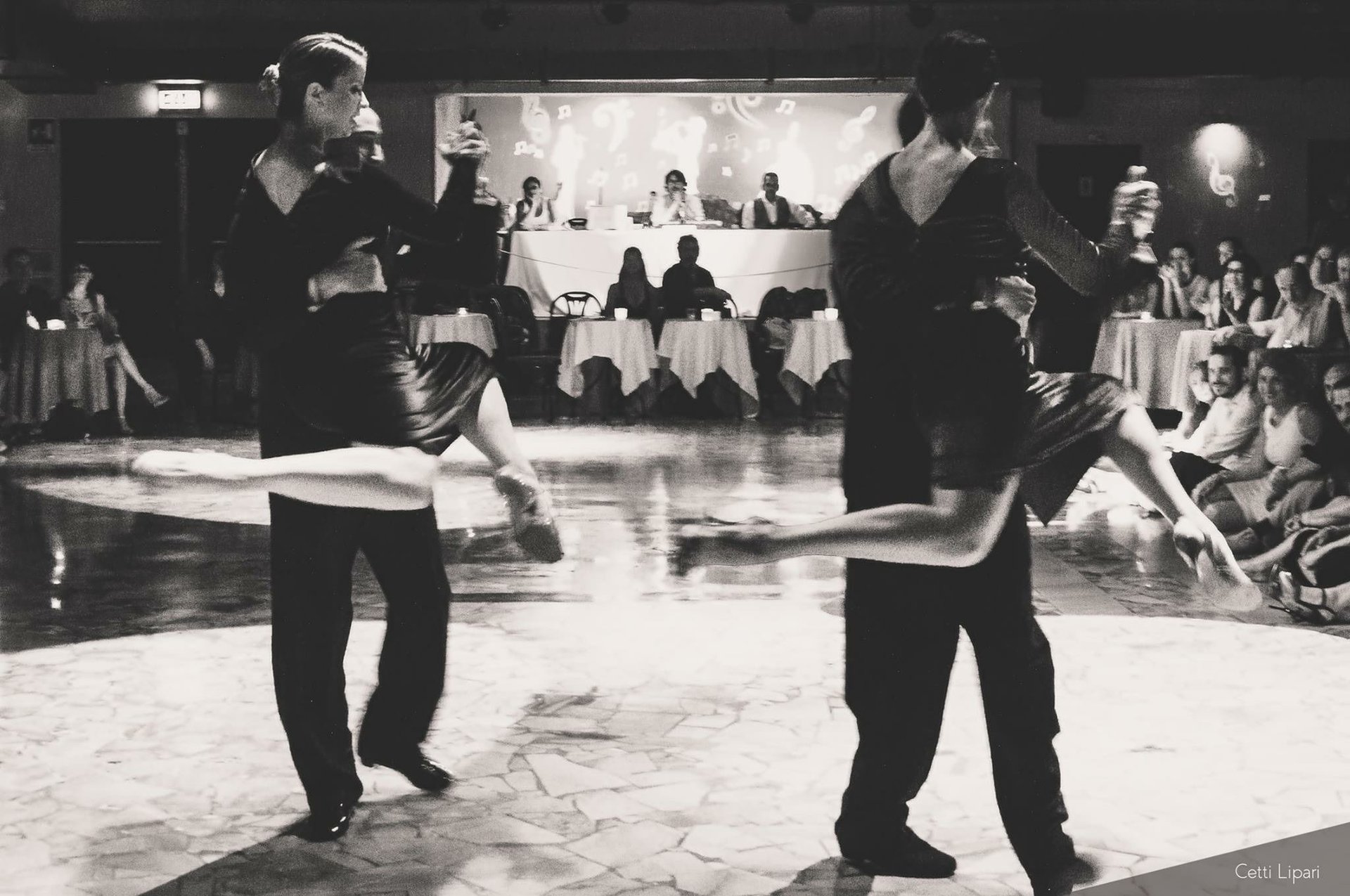 black and brown leather padded tub sofa