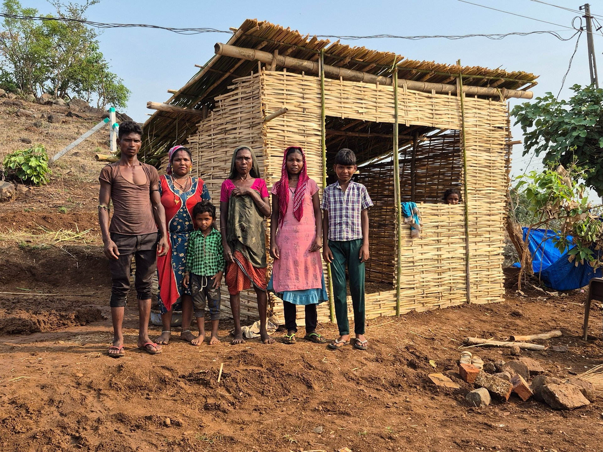 an abstract photo of a curved building with a blue sky in the background