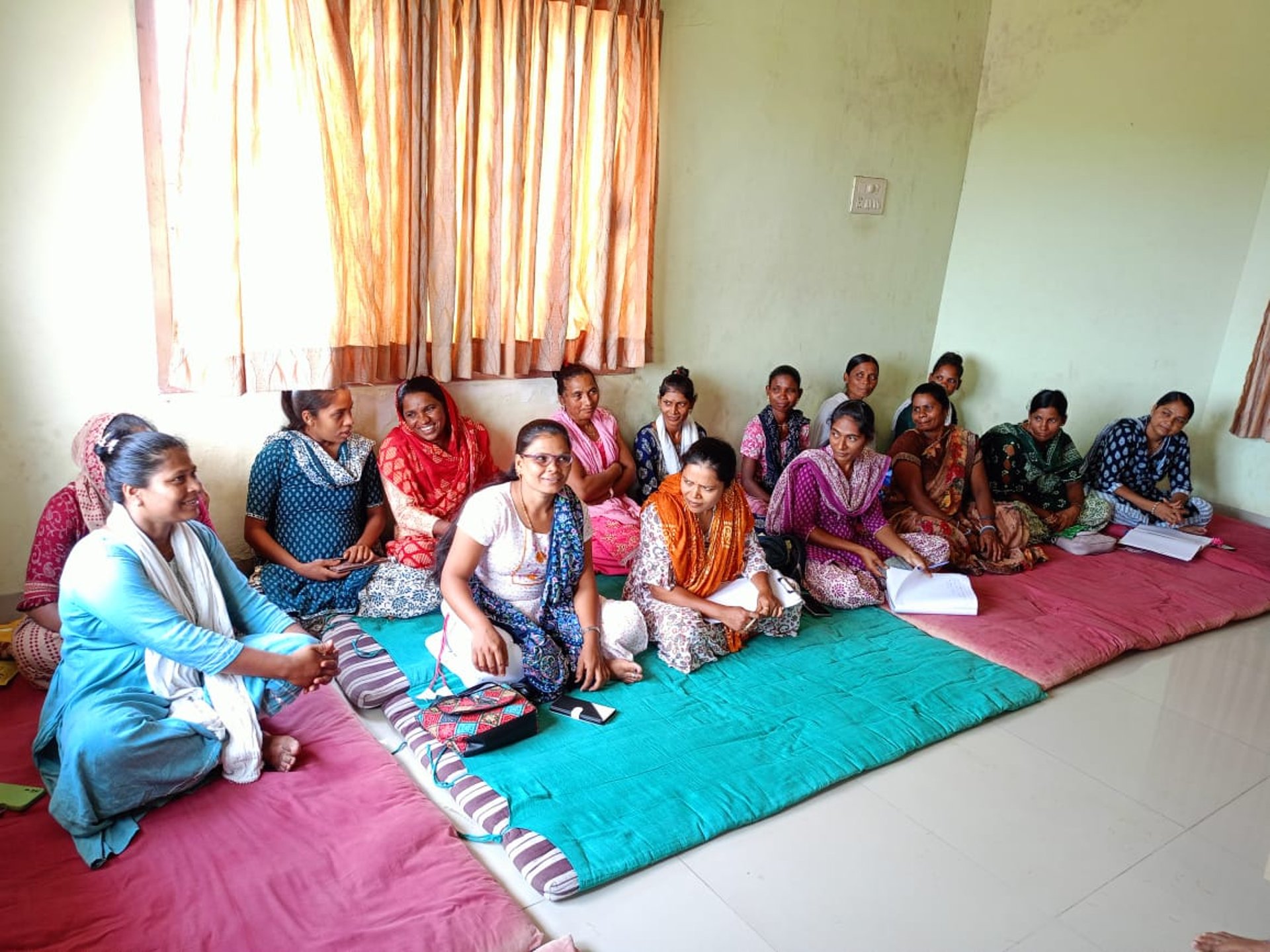 an abstract photo of a curved building with a blue sky in the background