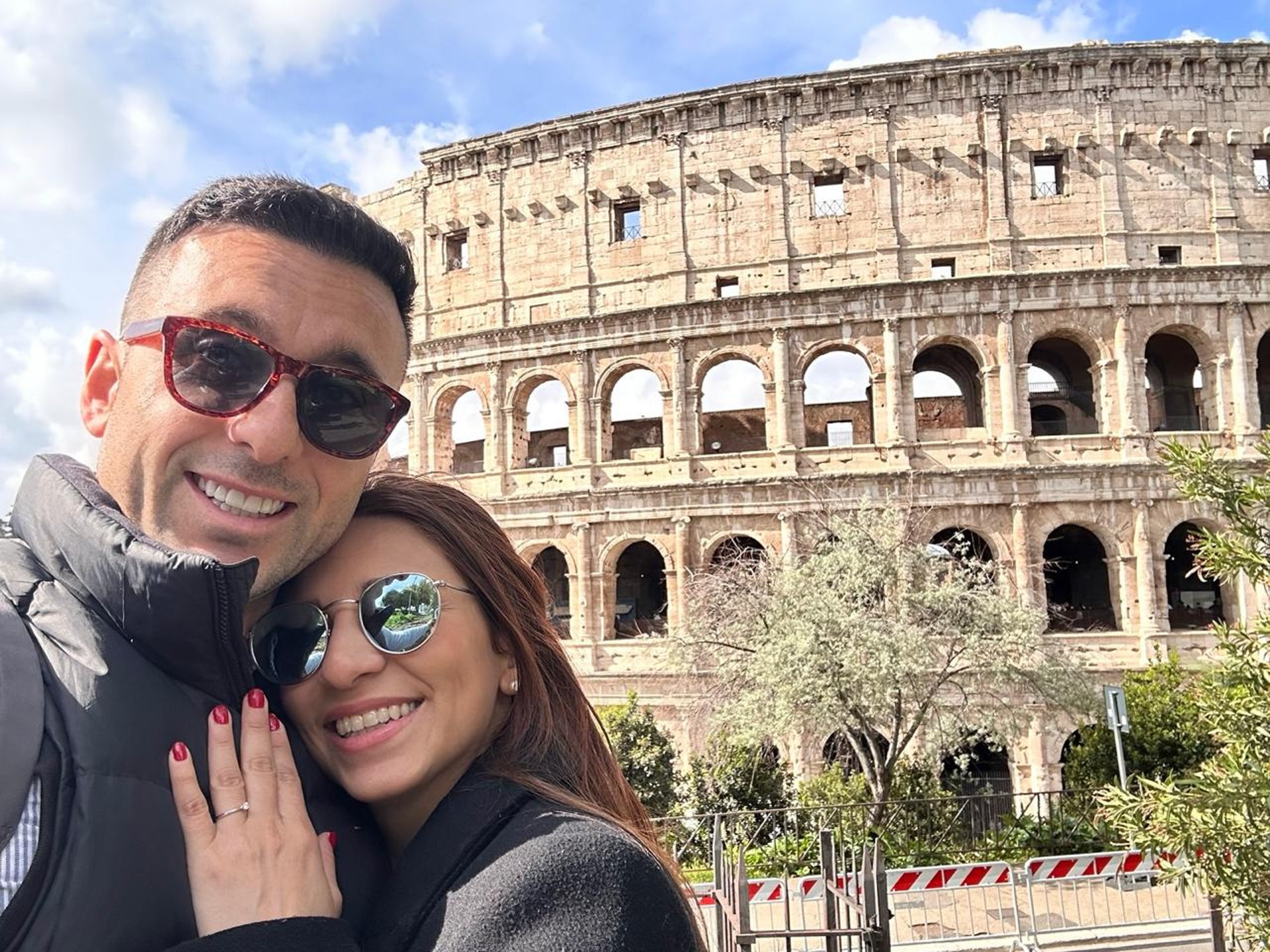 couple wearing silver-colored rings