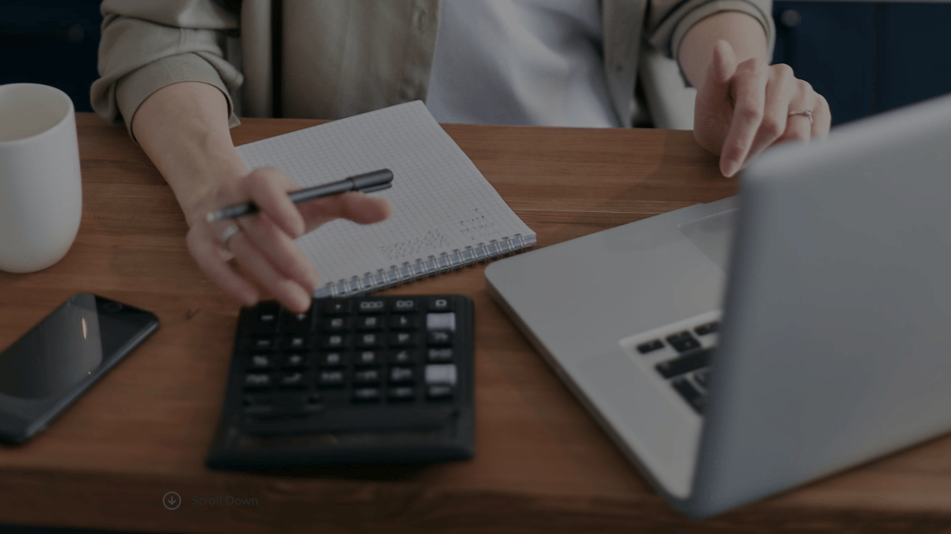 an abstract photo of a curved building with a blue sky in the background