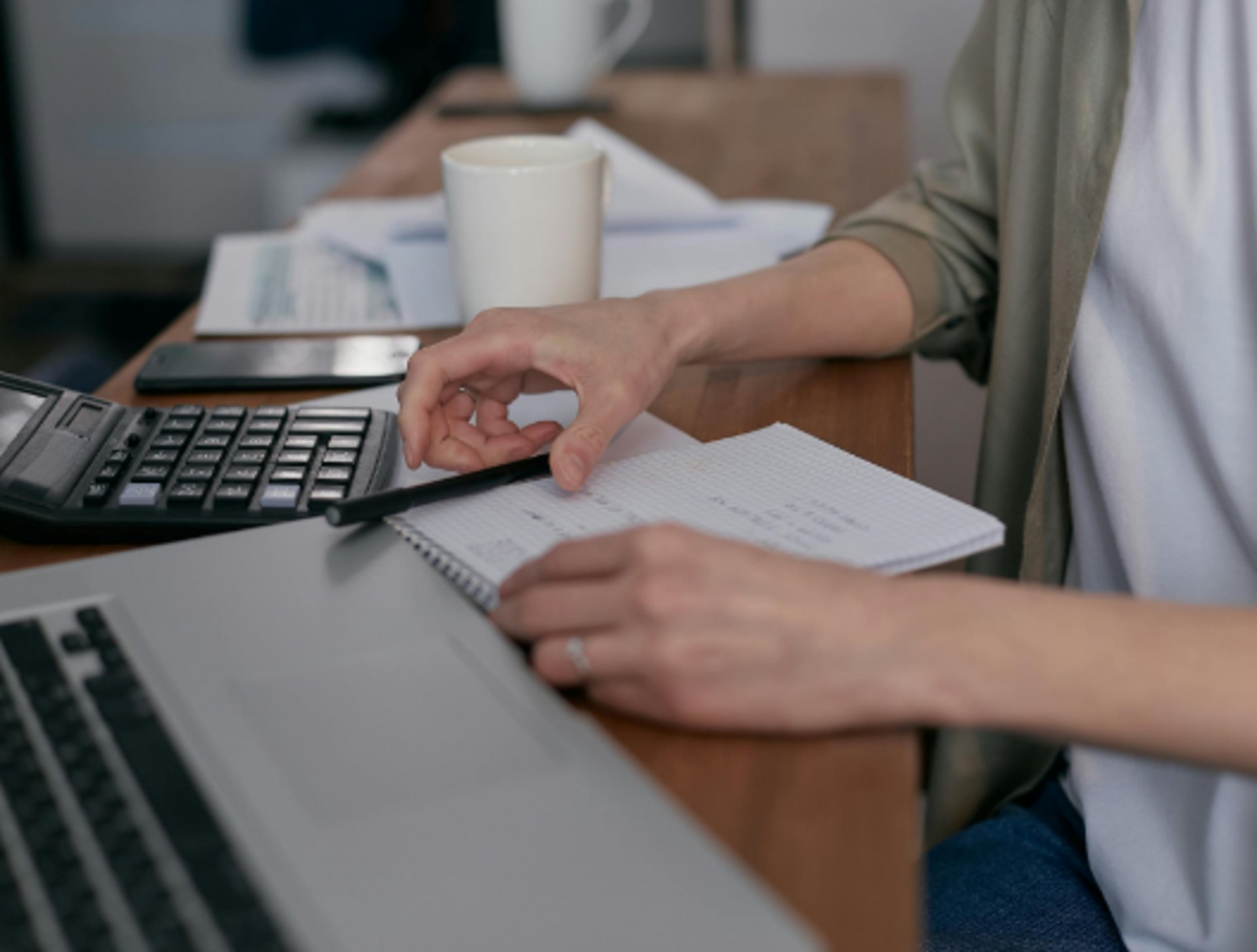 an abstract photo of a curved building with a blue sky in the background